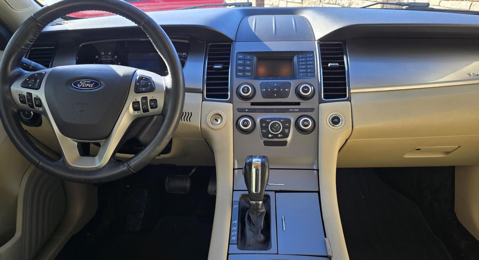 2016 White /Tan Ford Taurus SEL AWD (1FAHP2H83GG) with an 3.5L V6 DOHC 24V engine, 6A transmission, located at 450 N Russell, Missoula, MT, 59801, (406) 543-6600, 46.874496, -114.017433 - Classy Looking AWD Sedan. Peppy 3.5L V6 Engine. 6 Speed Automatic Transmission. Front Power Seats. Air. Cruise. Tilt. AM FM SAT CD. Bluetooth Audio and Phone. Power Windows and Locks. Goodyear Tires. Remote Start. We Finance through local Credit Unions. We do NOT offer In House (Buy Here Pay Her - Photo#17