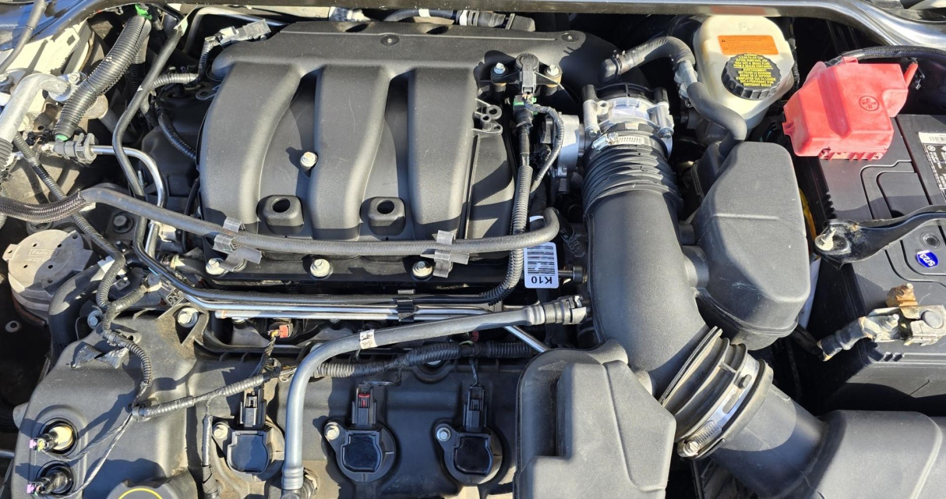 2016 White /Tan Ford Taurus SEL AWD (1FAHP2H83GG) with an 3.5L V6 DOHC 24V engine, 6A transmission, located at 450 N Russell, Missoula, MT, 59801, (406) 543-6600, 46.874496, -114.017433 - Classy Looking AWD Sedan. Peppy 3.5L V6 Engine. 6 Speed Automatic Transmission. Front Power Seats. Air. Cruise. Tilt. AM FM SAT CD. Bluetooth Audio and Phone. Power Windows and Locks. Goodyear Tires. Remote Start. We Finance through local Credit Unions. We do NOT offer In House (Buy Here Pay Her - Photo#18