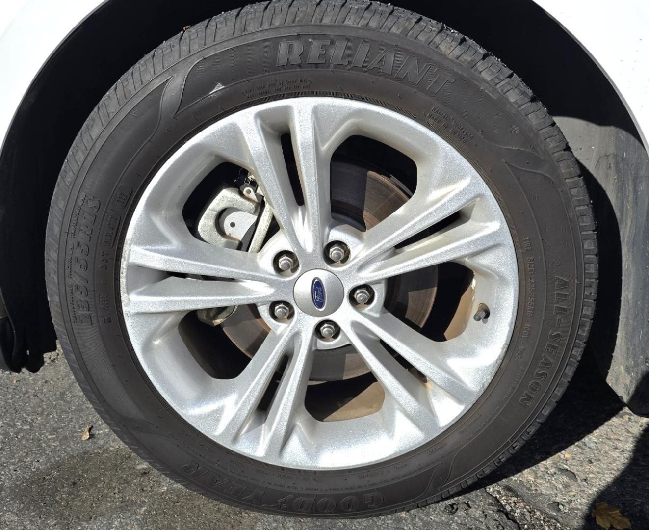 2016 White /Tan Ford Taurus SEL AWD (1FAHP2H83GG) with an 3.5L V6 DOHC 24V engine, 6A transmission, located at 450 N Russell, Missoula, MT, 59801, (406) 543-6600, 46.874496, -114.017433 - Classy Looking AWD Sedan. Peppy 3.5L V6 Engine. 6 Speed Automatic Transmission. Front Power Seats. Air. Cruise. Tilt. AM FM SAT CD. Bluetooth Audio and Phone. Power Windows and Locks. Goodyear Tires. Remote Start. We Finance through local Credit Unions. We do NOT offer In House (Buy Here Pay Her - Photo#19