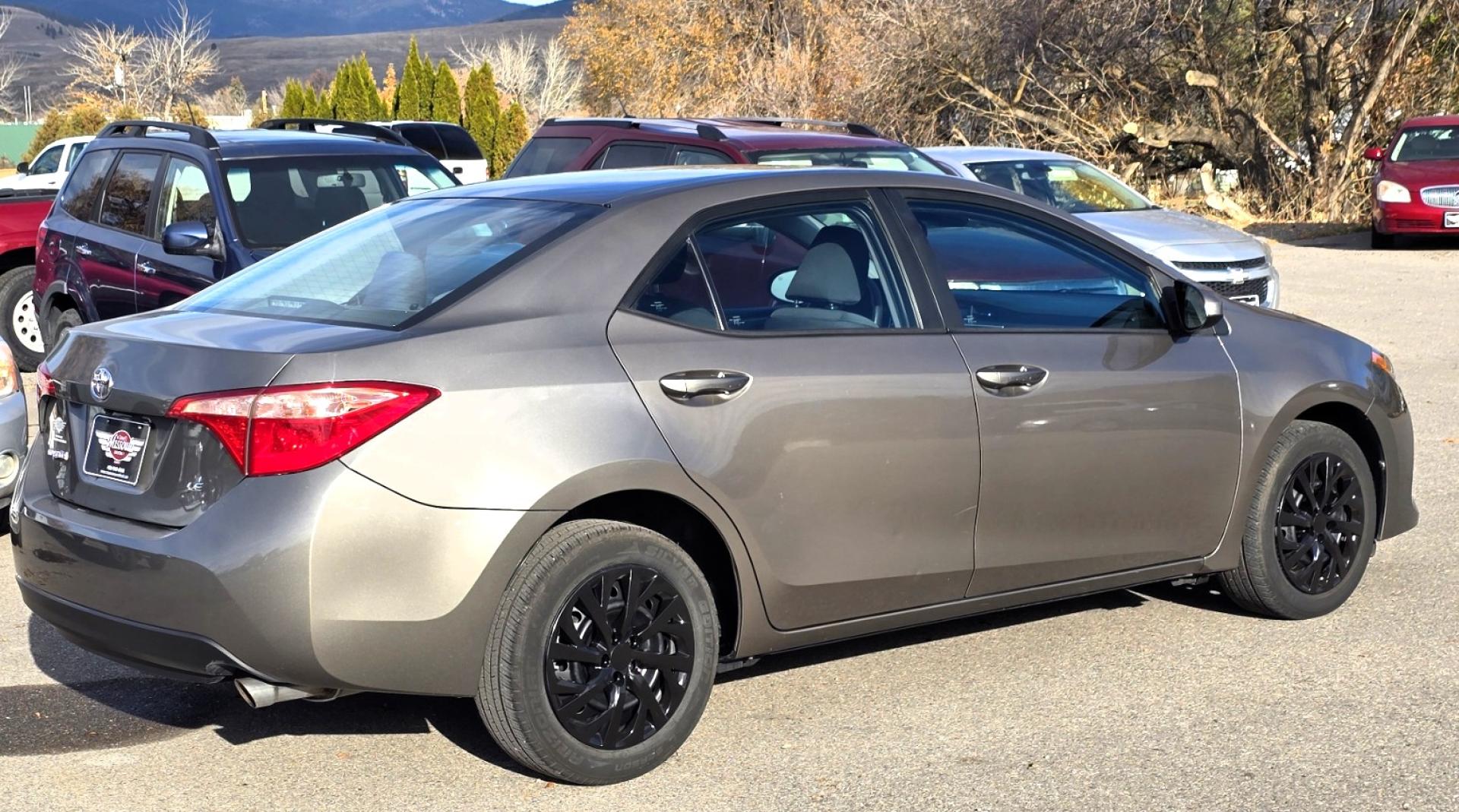 2019 Bronze /Gray Toyota Corolla L CVT (5YFBURHE8KP) with an 1.8L L4 DOHC 16V engine, CVT transmission, located at 450 N Russell, Missoula, MT, 59801, (406) 543-6600, 46.874496, -114.017433 - Excellent Condition 2019 Toyota. Only 66K Miles! Economical 1.8L I4 Engine. Air. Cruise. Tilt. Power Windows and Locks. AM FM SAT. Bluetooth Audio and Phone. Backup Camera. Touch Screen. We Finance through local Credit Unions. We do NOT offer In House (Buy Here Pay Here) Financing. - Photo#8