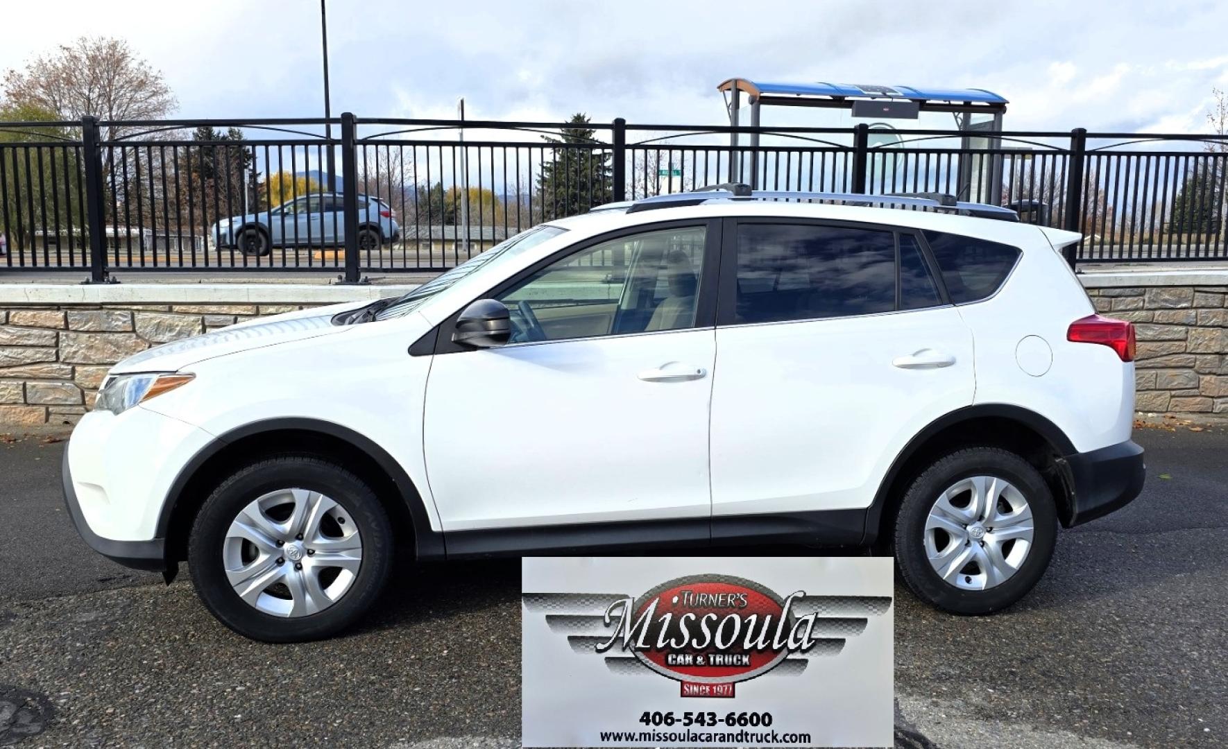 2013 White /Tan Toyota RAV4 LE AWD (JTMBFREV5D5) with an 2.5L L4 DOHC 16V engine, 6-Speed Automatic transmission, located at 450 N Russell, Missoula, MT, 59801, (406) 543-6600, 46.874496, -114.017433 - Extremely Clean 2 Owner AWD Toyota RAV4. 6 Speed Automatic Transmission. Air. Cruise. Tilt. Power Windows and Locks. AM FM CD Player. Bluetooth Audio and Phone. Backup Camera. Roof Rack. We Finance through local Credit Unions. We do NOT offer In House (Buy Here Pay Here) Financing. - Photo#7