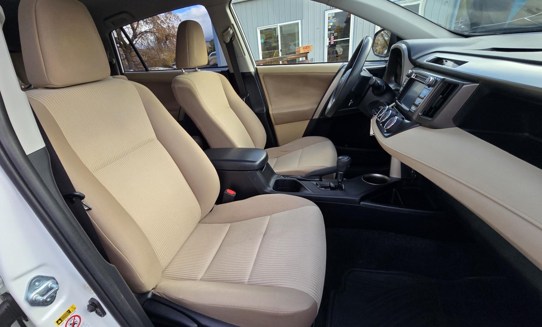 2013 White /Tan Toyota RAV4 LE AWD (JTMBFREV5D5) with an 2.5L L4 DOHC 16V engine, 6-Speed Automatic transmission, located at 450 N Russell, Missoula, MT, 59801, (406) 543-6600, 46.874496, -114.017433 - Extremely Clean 2 Owner AWD Toyota RAV4. 6 Speed Automatic Transmission. Air. Cruise. Tilt. Power Windows and Locks. AM FM CD Player. Bluetooth Audio and Phone. Backup Camera. Roof Rack. We Finance through local Credit Unions. We do NOT offer In House (Buy Here Pay Here) Financing. - Photo#12