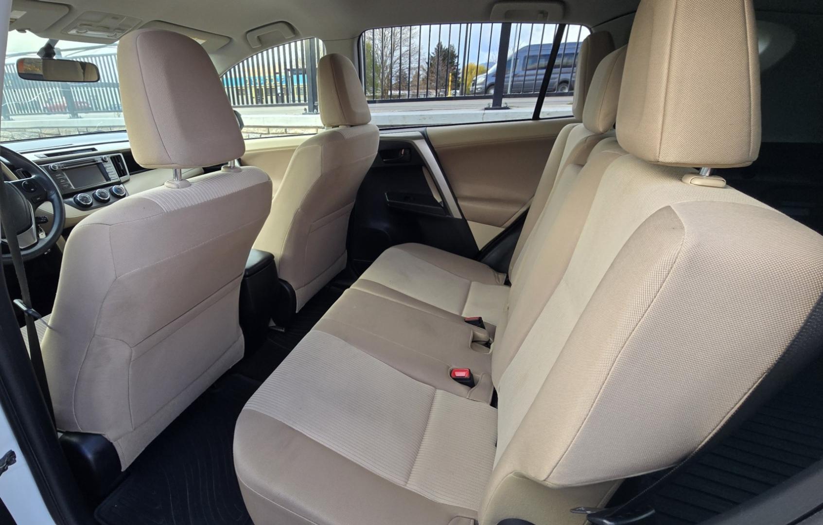 2013 White /Tan Toyota RAV4 LE AWD (JTMBFREV5D5) with an 2.5L L4 DOHC 16V engine, 6-Speed Automatic transmission, located at 450 N Russell, Missoula, MT, 59801, (406) 543-6600, 46.874496, -114.017433 - Extremely Clean 2 Owner AWD Toyota RAV4. 6 Speed Automatic Transmission. Air. Cruise. Tilt. Power Windows and Locks. AM FM CD Player. Bluetooth Audio and Phone. Backup Camera. Roof Rack. We Finance through local Credit Unions. We do NOT offer In House (Buy Here Pay Here) Financing. - Photo#13