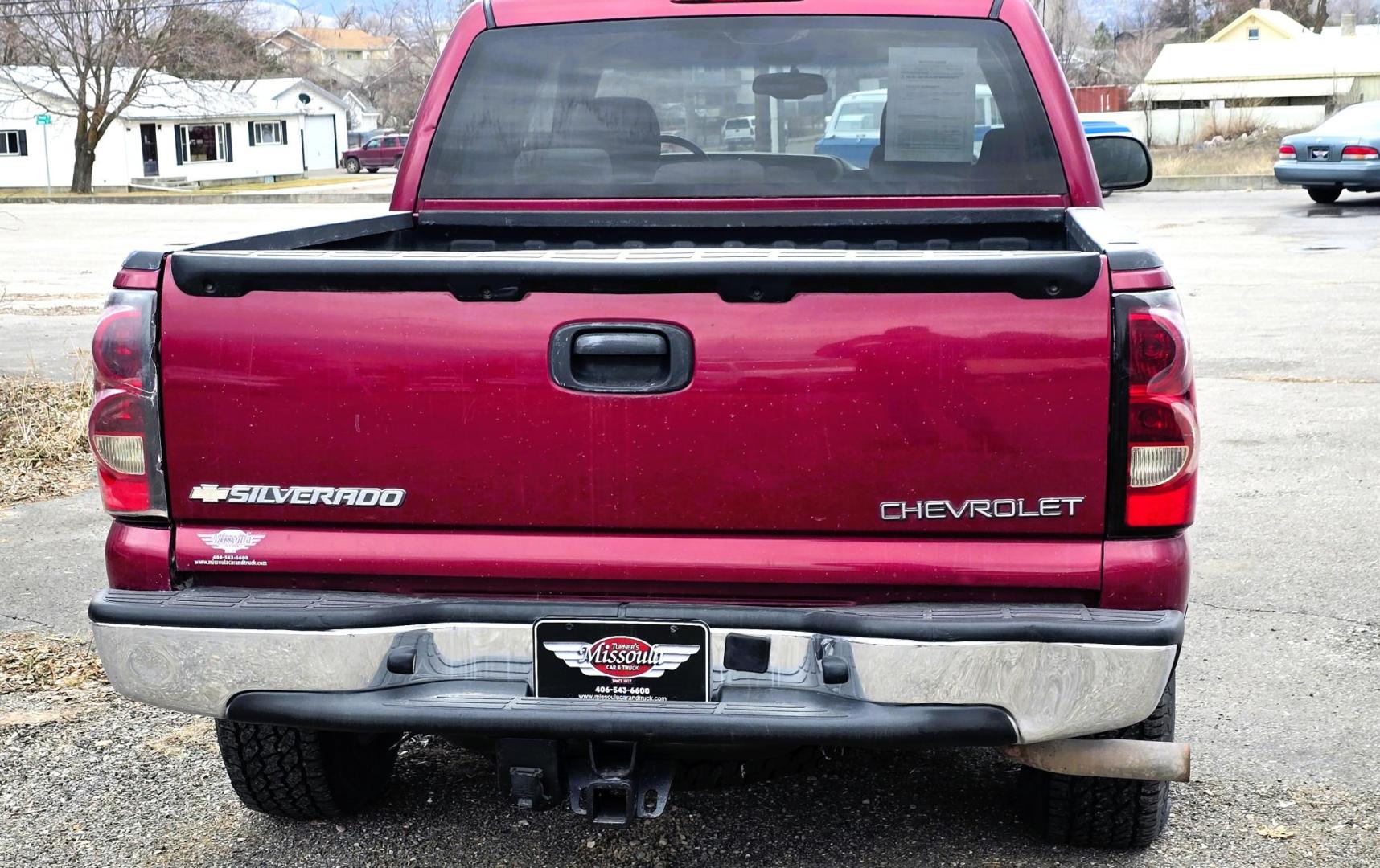 2004 Maroon /Gray Chevrolet Silverado 1500 LS Crew Cab 4WD (2GCEK13T641) with an 5.3L V8 OHV 16V engine, 4-Speed Automatic Overdrive transmission, located at 450 N Russell, Missoula, MT, 59801, (406) 543-6600, 46.874496, -114.017433 - Great Running 4WD Silverado. 4WD Automatic Transmission. 5.3L V8 Engine. Very Comfortable Seats. Air. Cruise. Tilt. Power Windows and Locks. AM FM CD Player. The vehicle was stolen from a previous owner in 2016. The Insurance paid off a total loss before the vehicle was recovered. Once it was recov - Photo#4