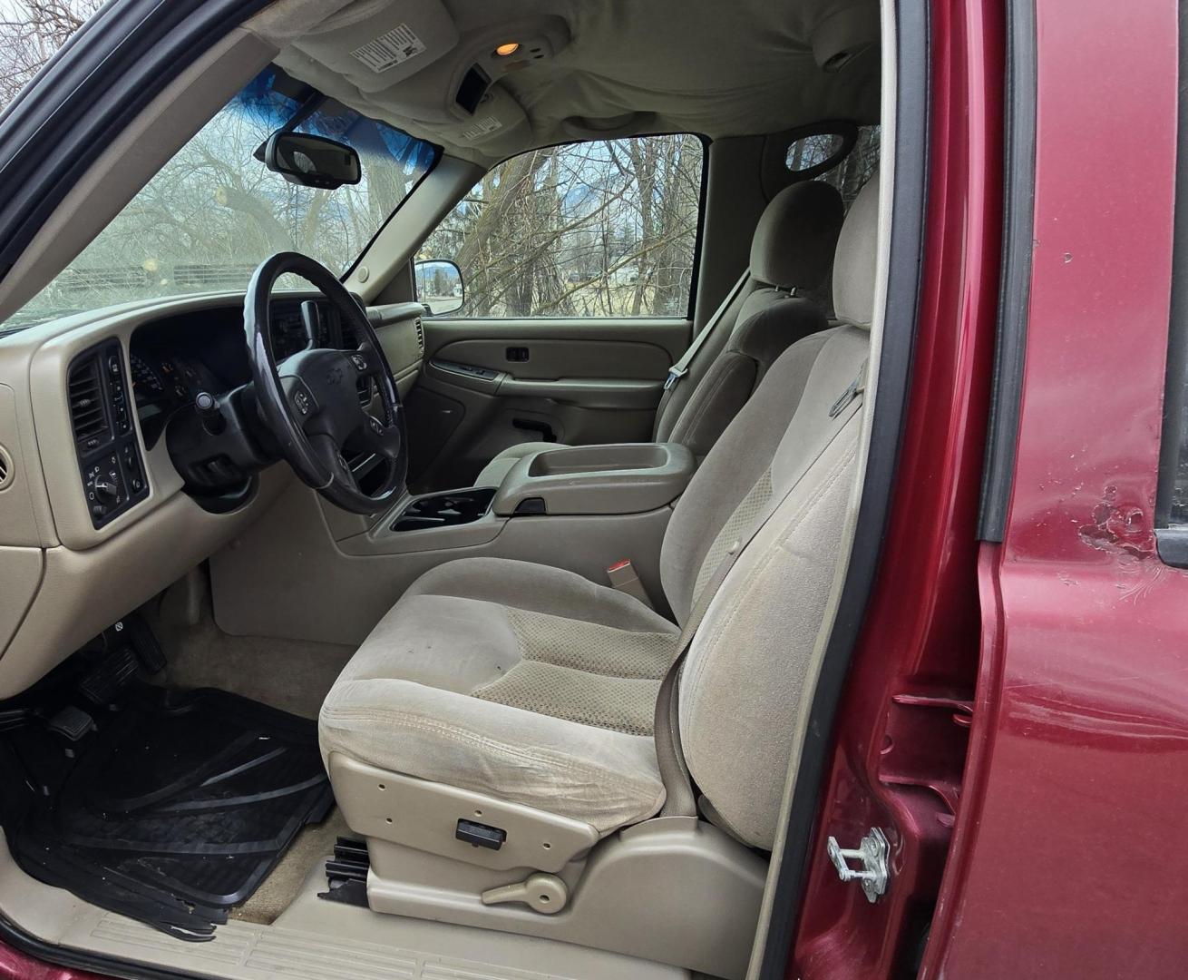 2004 Maroon /Gray Chevrolet Silverado 1500 LS Crew Cab 4WD (2GCEK13T641) with an 5.3L V8 OHV 16V engine, 4-Speed Automatic Overdrive transmission, located at 450 N Russell, Missoula, MT, 59801, (406) 543-6600, 46.874496, -114.017433 - Great Running 4WD Silverado. 4WD Automatic Transmission. 5.3L V8 Engine. Very Comfortable Seats. Air. Cruise. Tilt. Power Windows and Locks. AM FM CD Player. The vehicle was stolen from a previous owner in 2016. The Insurance paid off a total loss before the vehicle was recovered. Once it was recov - Photo#9