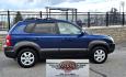 2005 Blue /White Hyundai Tucson GLS 2.7 4WD (KM8JN72D65U) with an 2.6L V6 DOHC 24V engine, 4-Speed Automatic Overdrive transmission, located at 450 N Russell, Missoula, MT, 59801, (406) 543-6600, 46.874496, -114.017433 - Hard to come across Affordable 2 Owner AWD SUV. Spunky 2.7L V6 Engine. Automatic Transmission. Power Sunroof. Power Windows and Locks. Heated Seats. Air. Cruise. Tilt. AM FM Cassette. Excellent Tires. Passenger Front Seat is a little worn so it has a seat cover on it. Because of the age, financi - Photo#0