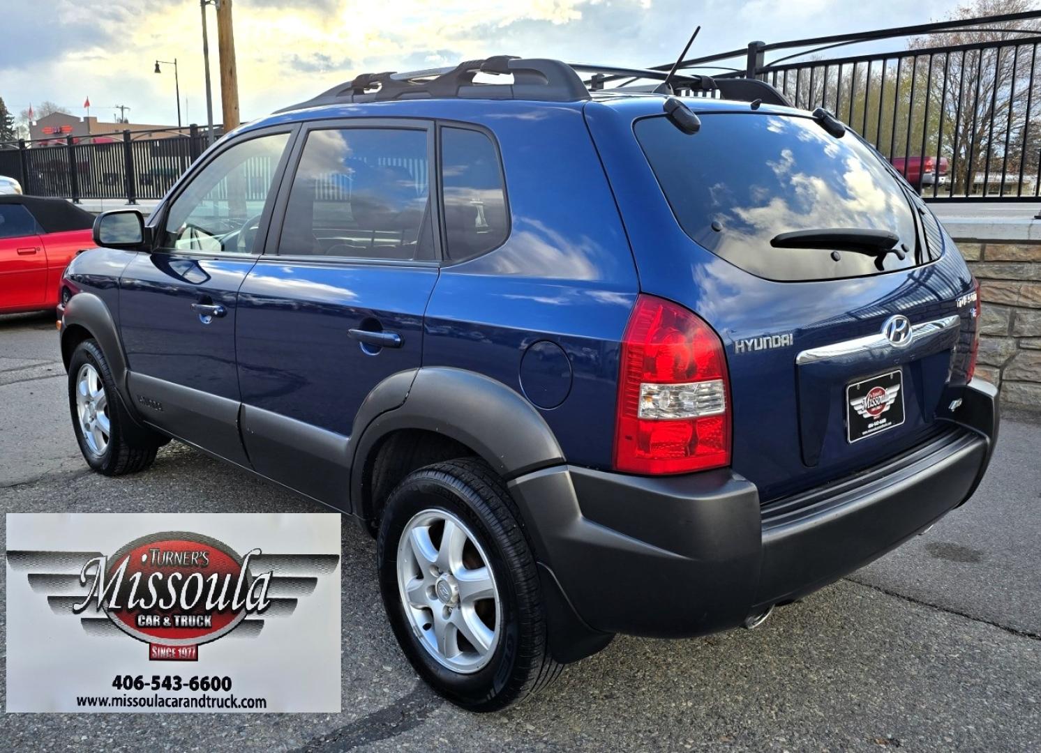 2005 Blue /White Hyundai Tucson GLS 2.7 4WD (KM8JN72D65U) with an 2.6L V6 DOHC 24V engine, 4-Speed Automatic Overdrive transmission, located at 450 N Russell, Missoula, MT, 59801, (406) 543-6600, 46.874496, -114.017433 - Hard to come across Affordable 2 Owner AWD SUV. Spunky 2.7L V6 Engine. Automatic Transmission. Power Sunroof. Power Windows and Locks. Heated Seats. Air. Cruise. Tilt. AM FM Cassette. Excellent Tires. Passenger Front Seat is a little worn so it has a seat cover on it. Because of the age, financi - Photo#7
