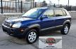 2005 Blue /White Hyundai Tucson GLS 2.7 4WD (KM8JN72D65U) with an 2.6L V6 DOHC 24V engine, 4-Speed Automatic Overdrive transmission, located at 450 N Russell, Missoula, MT, 59801, (406) 543-6600, 46.874496, -114.017433 - Hard to come across Affordable 2 Owner AWD SUV. Spunky 2.7L V6 Engine. Automatic Transmission. Power Sunroof. Power Windows and Locks. Heated Seats. Air. Cruise. Tilt. AM FM Cassette. Excellent Tires. Passenger Front Seat is a little worn so it has a seat cover on it. Because of the age, financi - Photo#6