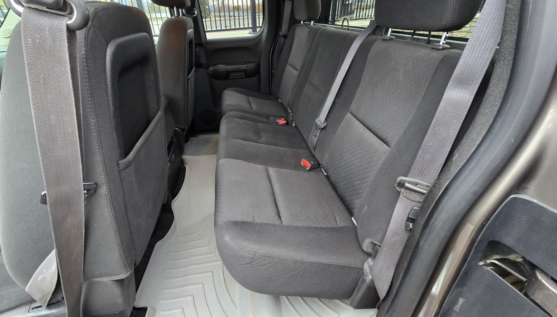 2013 Brown /Black GMC Sierra 2500HD SLE Ext. Cab 4WD (1GT220C86DZ) with an 6.6L V8 OHV 32V TURBO DIESEL engine, 6-Speed Automatic transmission, located at 450 N Russell, Missoula, MT, 59801, (406) 543-6600, 46.874496, -114.017433 - Rugged 4WD Chevy with a New Duramax Diesel Engine with only 25,000 miles on it. Tons of Upgrades and work done with receipts. Allison Automatic Transmission. Nice Flatbed. Power Windows and Locks. Air. Cruise. Tilt. AM FM CD Player. Running Boards. Nice Tires and Wheels. We Finance through local - Photo#7