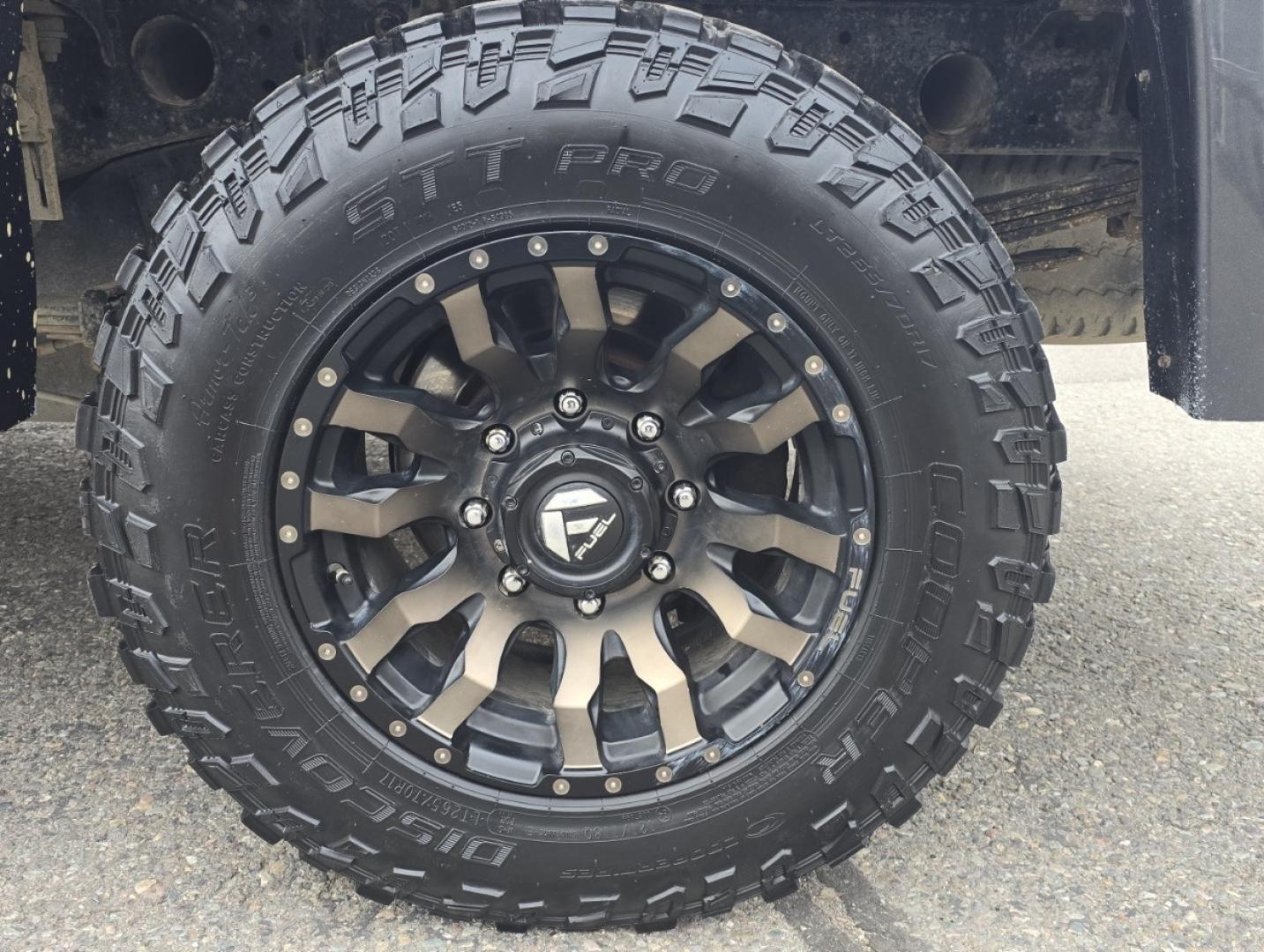 2013 Brown /Black GMC Sierra 2500HD SLE Ext. Cab 4WD (1GT220C86DZ) with an 6.6L V8 OHV 32V TURBO DIESEL engine, 6-Speed Automatic transmission, located at 450 N Russell, Missoula, MT, 59801, (406) 543-6600, 46.874496, -114.017433 - Rugged 4WD Chevy with a New Duramax Diesel Engine with only 25,000 miles on it. Tons of Upgrades and work done with receipts. Allison Automatic Transmission. Nice Flatbed. Power Windows and Locks. Air. Cruise. Tilt. AM FM CD Player. Running Boards. Nice Tires and Wheels. We Finance through local - Photo#11