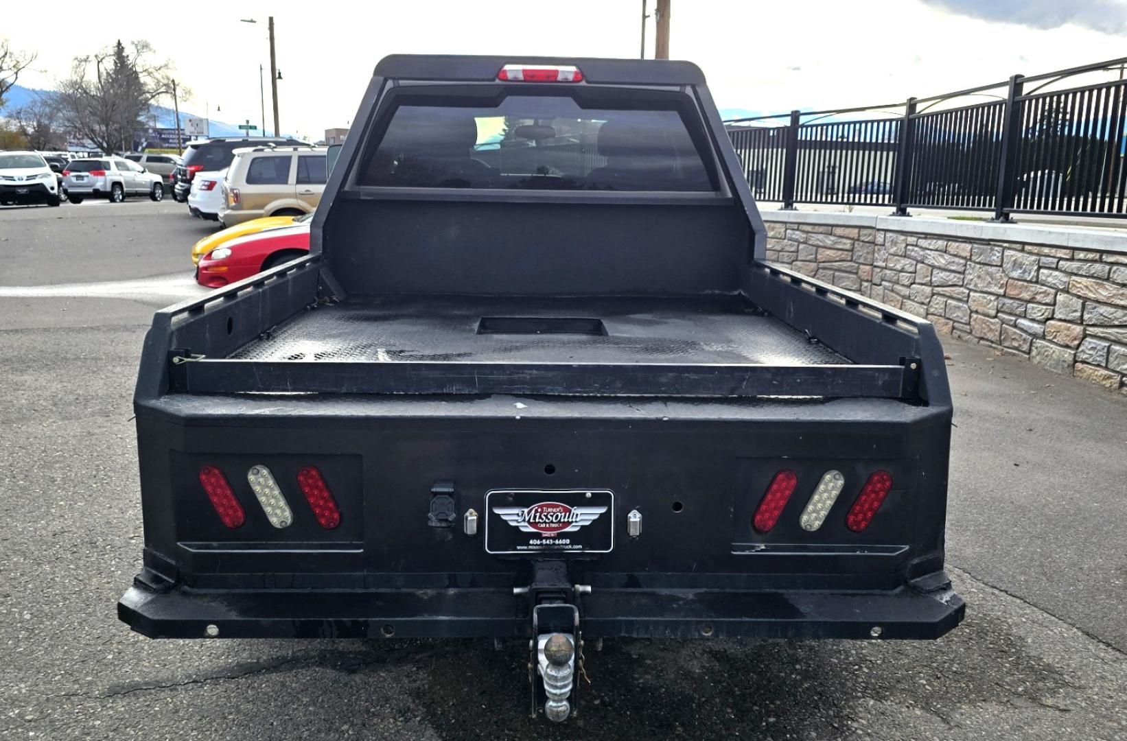 2013 Brown /Black GMC Sierra 2500HD SLE Ext. Cab 4WD (1GT220C86DZ) with an 6.6L V8 OHV 32V TURBO DIESEL engine, 6-Speed Automatic transmission, located at 450 N Russell, Missoula, MT, 59801, (406) 543-6600, 46.874496, -114.017433 - Rugged 4WD Chevy with a New Duramax Diesel Engine with only 25,000 miles on it. Tons of Upgrades and work done with receipts. Allison Automatic Transmission. Nice Flatbed. Power Windows and Locks. Air. Cruise. Tilt. AM FM CD Player. Running Boards. Nice Tires and Wheels. We Finance through local - Photo#14