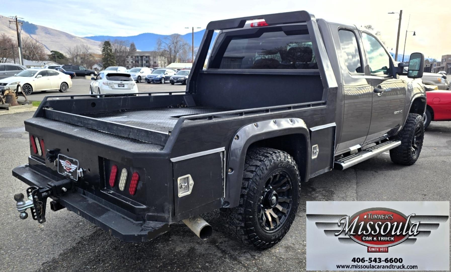 2013 Brown /Black GMC Sierra 2500HD SLE Ext. Cab 4WD (1GT220C86DZ) with an 6.6L V8 OHV 32V TURBO DIESEL engine, 6-Speed Automatic transmission, located at 450 N Russell, Missoula, MT, 59801, (406) 543-6600, 46.874496, -114.017433 - Rugged 4WD Chevy with a New Duramax Diesel Engine with only 25,000 miles on it. Tons of Upgrades and work done with receipts. Allison Automatic Transmission. Nice Flatbed. Power Windows and Locks. Air. Cruise. Tilt. AM FM CD Player. Running Boards. Nice Tires and Wheels. We Finance through local - Photo#15