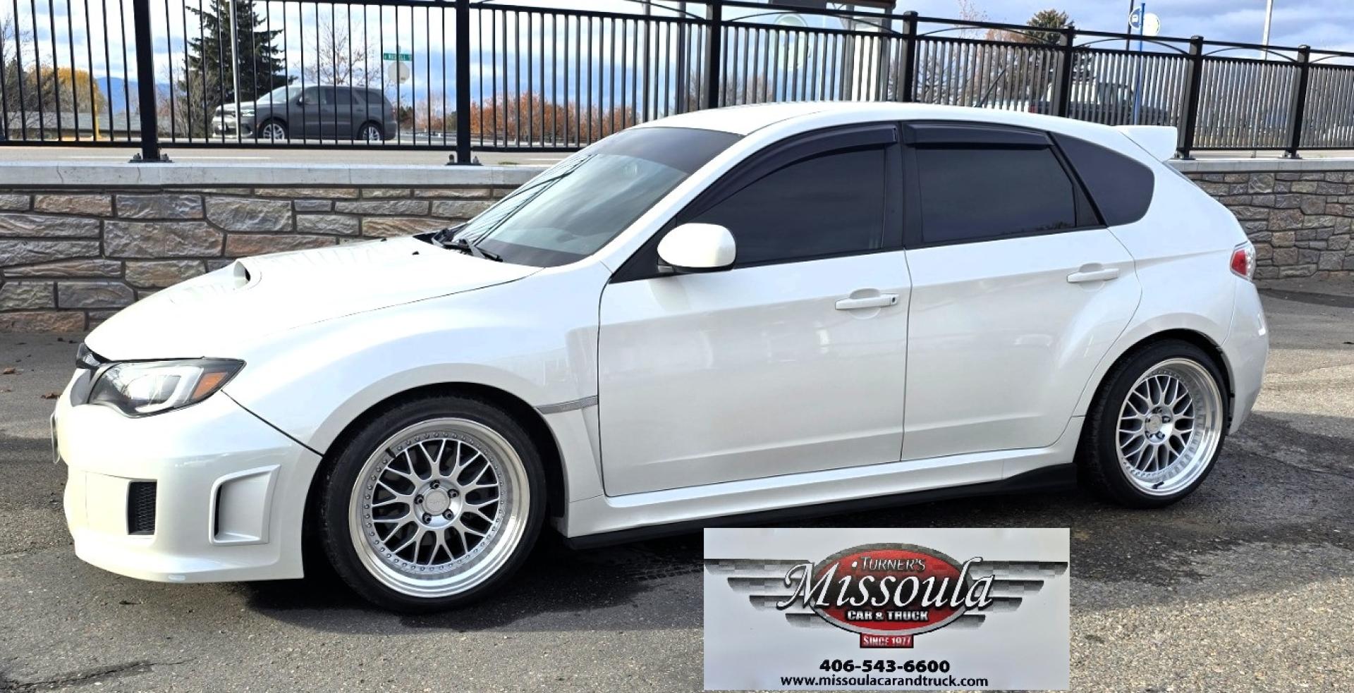 2012 White /Black Subaru Impreza WRX WRX Turbo (JF1GR7E65CG) with an 2.5L H4 DOHC 16V TURBO engine, 5-Speed Manual transmission, located at 450 N Russell, Missoula, MT, 59801, (406) 543-6600, 46.874496, -114.017433 - Zippy Little Subaru AWD with only 86K Miles. 2.5L H4 Turbo Engine. 5 Speed Manual Transmission. WRX Package with Nice Bucket Seats. Air. Cruise. Tilt. Power Windows and Locks. AM FM SAT CD Player. Bluetooth Phone Connection. Nice Wheels with Brand New Tires. Cat back exhaust adjustable coil overs - Photo#3