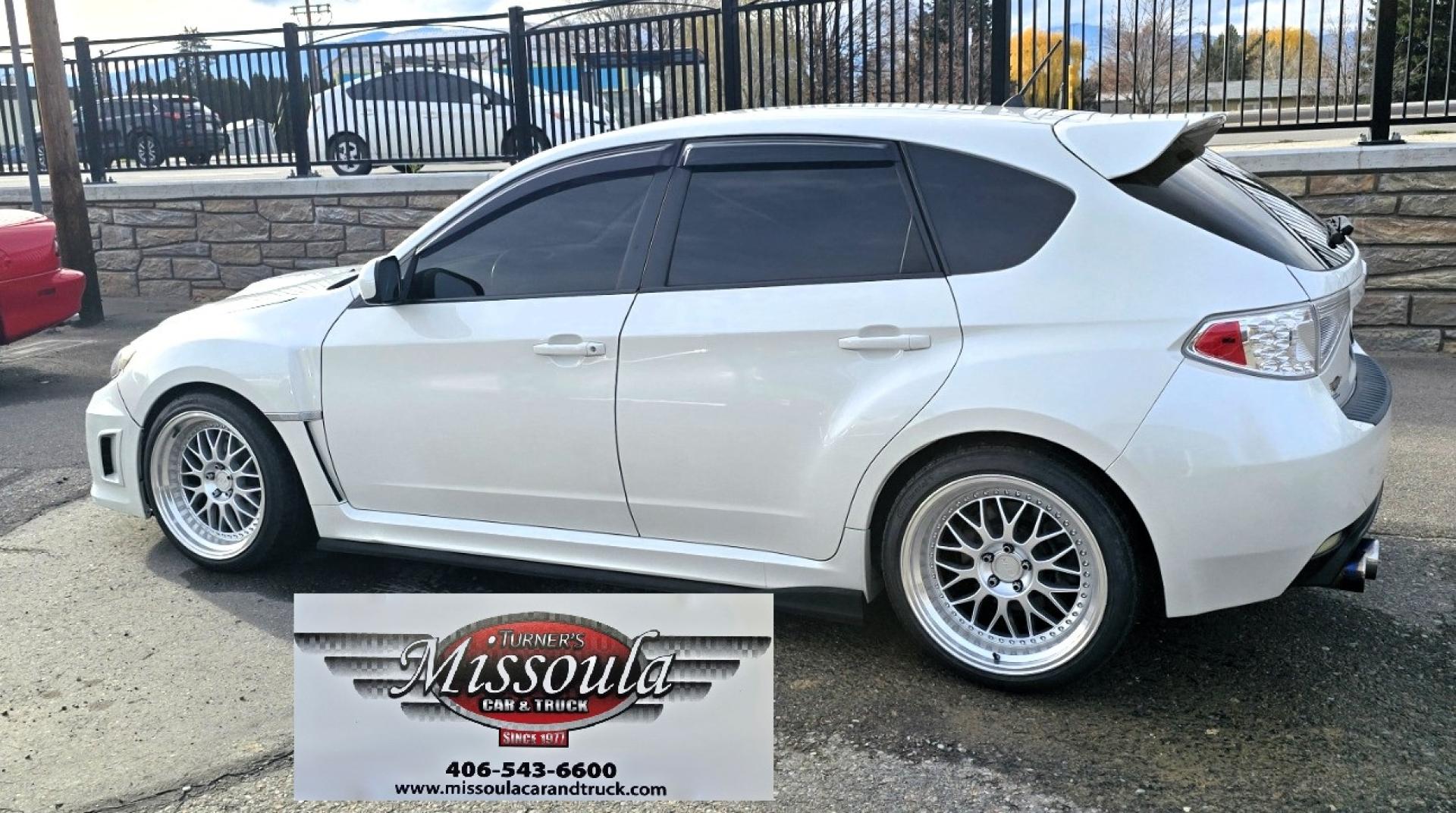 2012 White /Black Subaru Impreza WRX WRX Turbo (JF1GR7E65CG) with an 2.5L H4 DOHC 16V TURBO engine, 5-Speed Manual transmission, located at 450 N Russell, Missoula, MT, 59801, (406) 543-6600, 46.874496, -114.017433 - Zippy Little Subaru AWD with only 86K Miles. 2.5L H4 Turbo Engine. 5 Speed Manual Transmission. WRX Package with Nice Bucket Seats. Air. Cruise. Tilt. Power Windows and Locks. AM FM SAT CD Player. Bluetooth Phone Connection. Nice Wheels with Brand New Tires. Cat back exhaust adjustable coil overs - Photo#5