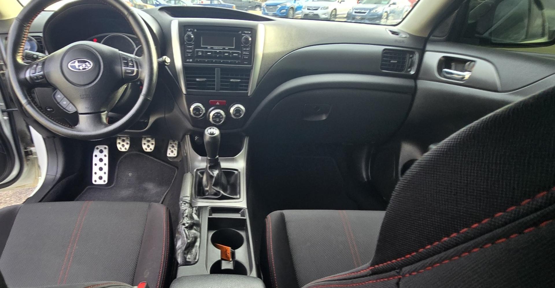 2012 White /Black Subaru Impreza WRX WRX Turbo (JF1GR7E65CG) with an 2.5L H4 DOHC 16V TURBO engine, 5-Speed Manual transmission, located at 450 N Russell, Missoula, MT, 59801, (406) 543-6600, 46.874496, -114.017433 - Zippy Little Subaru AWD with only 86K Miles. 2.5L H4 Turbo Engine. 5 Speed Manual Transmission. WRX Package with Nice Bucket Seats. Air. Cruise. Tilt. Power Windows and Locks. AM FM SAT CD Player. Bluetooth Phone Connection. Nice Wheels with Brand New Tires. Cat back exhaust adjustable coil overs - Photo#12