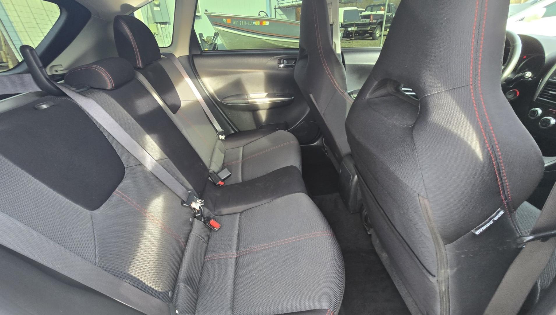 2012 White /Black Subaru Impreza WRX WRX Turbo (JF1GR7E65CG) with an 2.5L H4 DOHC 16V TURBO engine, 5-Speed Manual transmission, located at 450 N Russell, Missoula, MT, 59801, (406) 543-6600, 46.874496, -114.017433 - Zippy Little Subaru AWD with only 86K Miles. 2.5L H4 Turbo Engine. 5 Speed Manual Transmission. WRX Package with Nice Bucket Seats. Air. Cruise. Tilt. Power Windows and Locks. AM FM SAT CD Player. Bluetooth Phone Connection. Nice Wheels with Brand New Tires. Cat back exhaust adjustable coil overs - Photo#15