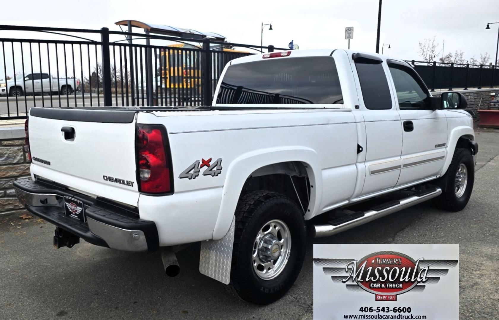 2004 White /Black Chevrolet Silverado 2500HD Ext. Cab Long Bed 4WD (1GCHK29G54E) with an 8.1L V8 OHV 16V engine, Automatic Transmission transmission, located at 450 N Russell, Missoula, MT, 59801, (406) 543-6600, 46.874496, -114.017433 - Near Impossible to find. Heavy Duty 3/4 Ton Chevy 4WD with the Impressive 8.1 Liter Vortec Engine. To top that, it only has 64K Miles! Excellent Condition. Automatic Transmission. Air. Cruise. Tilt. Power Windows and Locks. Power Drivers Seat. AM FM CD and Cassette Player for kicking it Old School. - Photo#2
