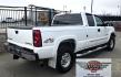 2004 White /Black Chevrolet Silverado 2500HD Ext. Cab Long Bed 4WD (1GCHK29G54E) with an 8.1L V8 OHV 16V engine, Automatic Transmission transmission, located at 450 N Russell, Missoula, MT, 59801, (406) 543-6600, 46.874496, -114.017433 - Near Impossible to find. Heavy Duty 3/4 Ton Chevy 4WD with the Impressive 8.1 Liter Vortec Engine. To top that, it only has 64K Miles! Excellent Condition. Automatic Transmission. Air. Cruise. Tilt. Power Windows and Locks. Power Drivers Seat. AM FM CD and Cassette Player for kicking it Old School. - Photo#2