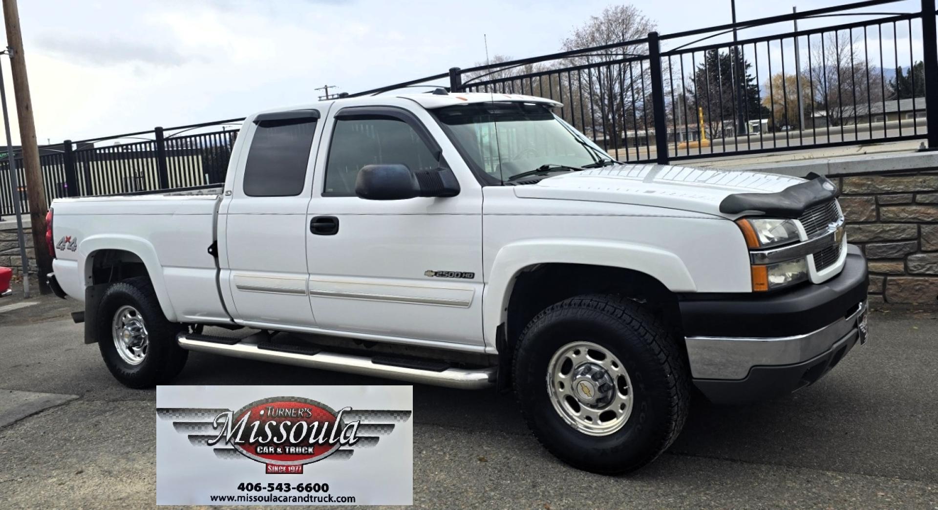 2004 White /Black Chevrolet Silverado 2500HD Ext. Cab Long Bed 4WD (1GCHK29G54E) with an 8.1L V8 OHV 16V engine, Automatic Transmission transmission, located at 450 N Russell, Missoula, MT, 59801, (406) 543-6600, 46.874496, -114.017433 - Near Impossible to find. Heavy Duty 3/4 Ton Chevy 4WD with the Impressive 8.1 Liter Vortec Engine. To top that, it only has 64K Miles! Excellent Condition. Automatic Transmission. Air. Cruise. Tilt. Power Windows and Locks. Power Drivers Seat. AM FM CD and Cassette Player for kicking it Old School. - Photo#4