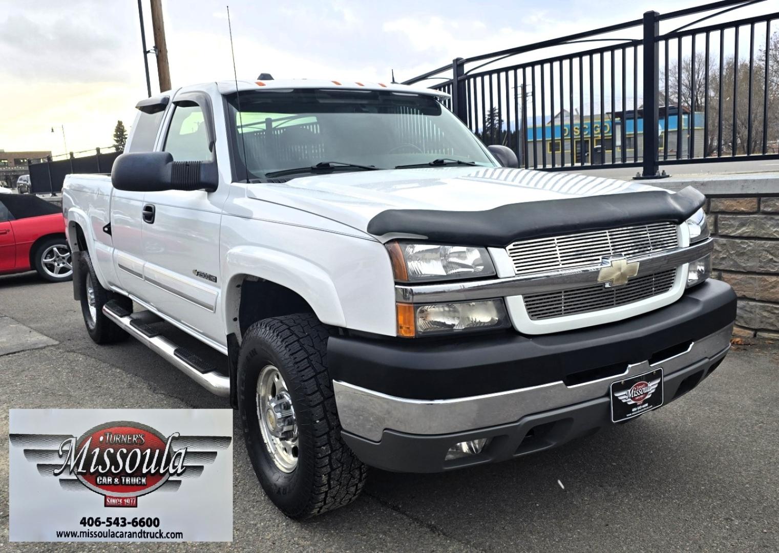 2004 White /Black Chevrolet Silverado 2500HD Ext. Cab Long Bed 4WD (1GCHK29G54E) with an 8.1L V8 OHV 16V engine, Automatic Transmission transmission, located at 450 N Russell, Missoula, MT, 59801, (406) 543-6600, 46.874496, -114.017433 - Near Impossible to find. Heavy Duty 3/4 Ton Chevy 4WD with the Impressive 8.1 Liter Vortec Engine. To top that, it only has 64K Miles! Excellent Condition. Automatic Transmission. Air. Cruise. Tilt. Power Windows and Locks. Power Drivers Seat. AM FM CD and Cassette Player for kicking it Old School. - Photo#5