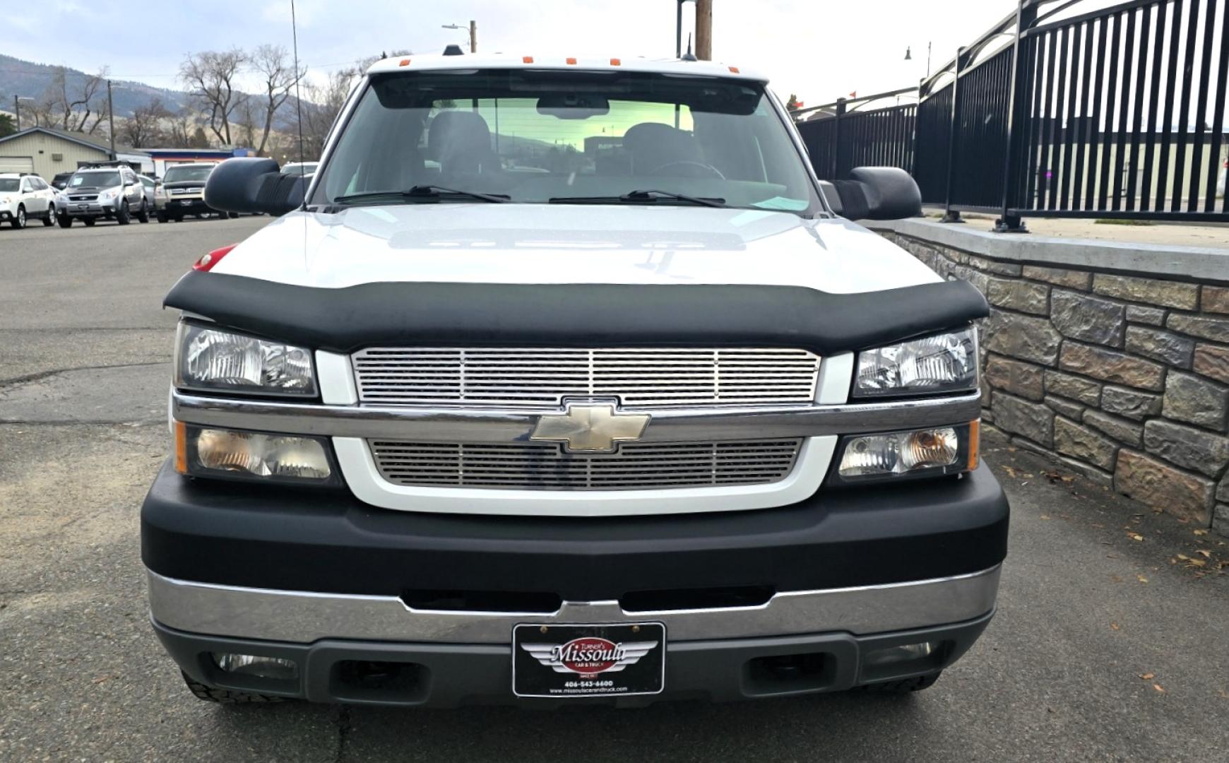 2004 White /Black Chevrolet Silverado 2500HD Ext. Cab Long Bed 4WD (1GCHK29G54E) with an 8.1L V8 OHV 16V engine, Automatic Transmission transmission, located at 450 N Russell, Missoula, MT, 59801, (406) 543-6600, 46.874496, -114.017433 - Near Impossible to find. Heavy Duty 3/4 Ton Chevy 4WD with the Impressive 8.1 Liter Vortec Engine. To top that, it only has 64K Miles! Excellent Condition. Automatic Transmission. Air. Cruise. Tilt. Power Windows and Locks. Power Drivers Seat. AM FM CD and Cassette Player for kicking it Old School. - Photo#6