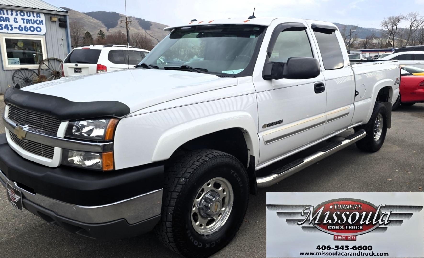 2004 White /Black Chevrolet Silverado 2500HD Ext. Cab Long Bed 4WD (1GCHK29G54E) with an 8.1L V8 OHV 16V engine, Automatic Transmission transmission, located at 450 N Russell, Missoula, MT, 59801, (406) 543-6600, 46.874496, -114.017433 - Near Impossible to find. Heavy Duty 3/4 Ton Chevy 4WD with the Impressive 8.1 Liter Vortec Engine. To top that, it only has 64K Miles! Excellent Condition. Automatic Transmission. Air. Cruise. Tilt. Power Windows and Locks. Power Drivers Seat. AM FM CD and Cassette Player for kicking it Old School. - Photo#7