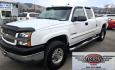 2004 White /Black Chevrolet Silverado 2500HD Ext. Cab Long Bed 4WD (1GCHK29G54E) with an 8.1L V8 OHV 16V engine, Automatic Transmission transmission, located at 450 N Russell, Missoula, MT, 59801, (406) 543-6600, 46.874496, -114.017433 - Near Impossible to find. Heavy Duty 3/4 Ton Chevy 4WD with the Impressive 8.1 Liter Vortec Engine. To top that, it only has 64K Miles! Excellent Condition. Automatic Transmission. Air. Cruise. Tilt. Power Windows and Locks. Power Drivers Seat. AM FM CD and Cassette Player for kicking it Old School. - Photo#7