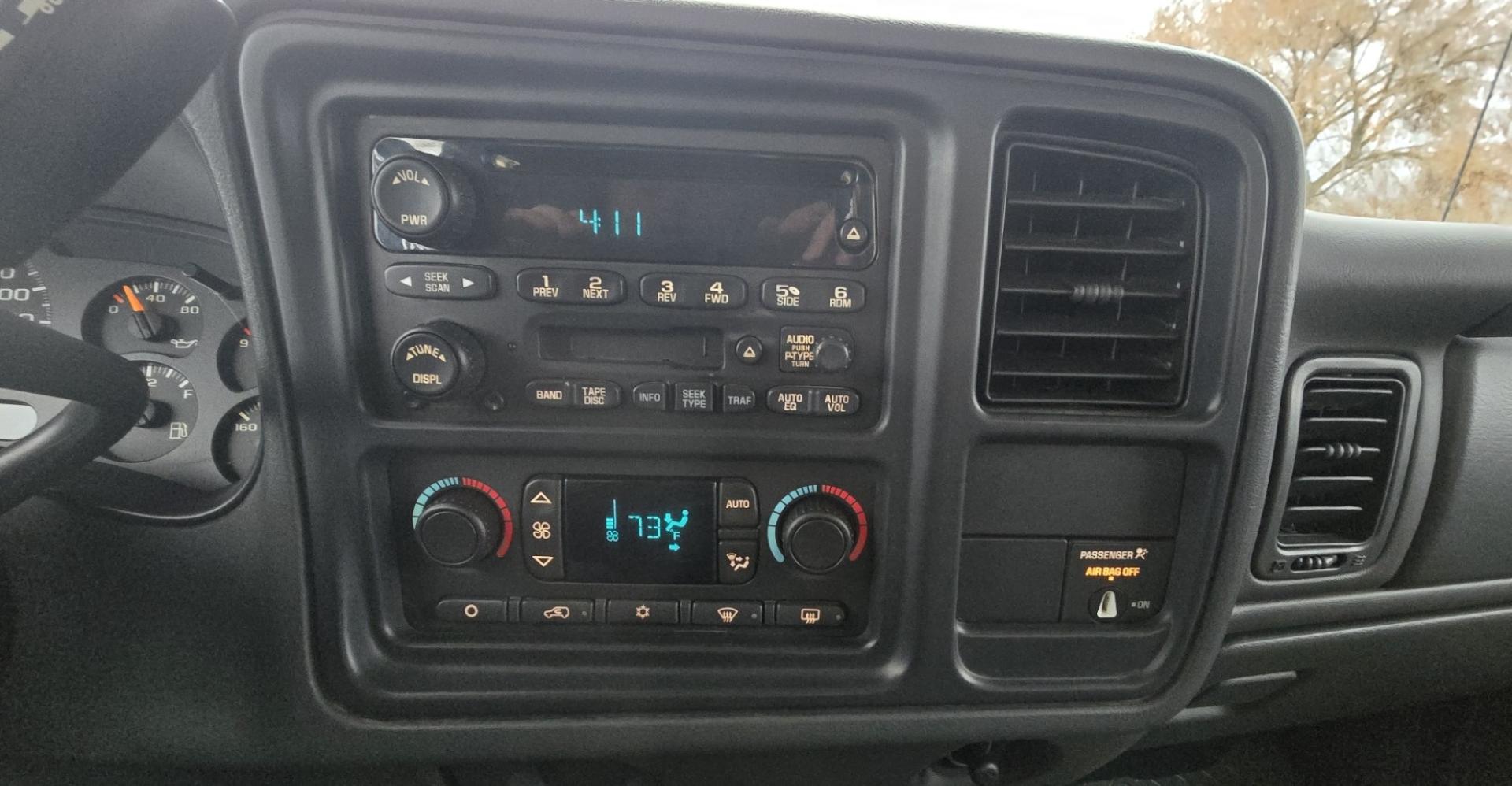 2004 White /Black Chevrolet Silverado 2500HD Ext. Cab Long Bed 4WD (1GCHK29G54E) with an 8.1L V8 OHV 16V engine, Automatic Transmission transmission, located at 450 N Russell, Missoula, MT, 59801, (406) 543-6600, 46.874496, -114.017433 - Near Impossible to find. Heavy Duty 3/4 Ton Chevy 4WD with the Impressive 8.1 Liter Vortec Engine. To top that, it only has 64K Miles! Excellent Condition. Automatic Transmission. Air. Cruise. Tilt. Power Windows and Locks. Power Drivers Seat. AM FM CD and Cassette Player for kicking it Old School. - Photo#11