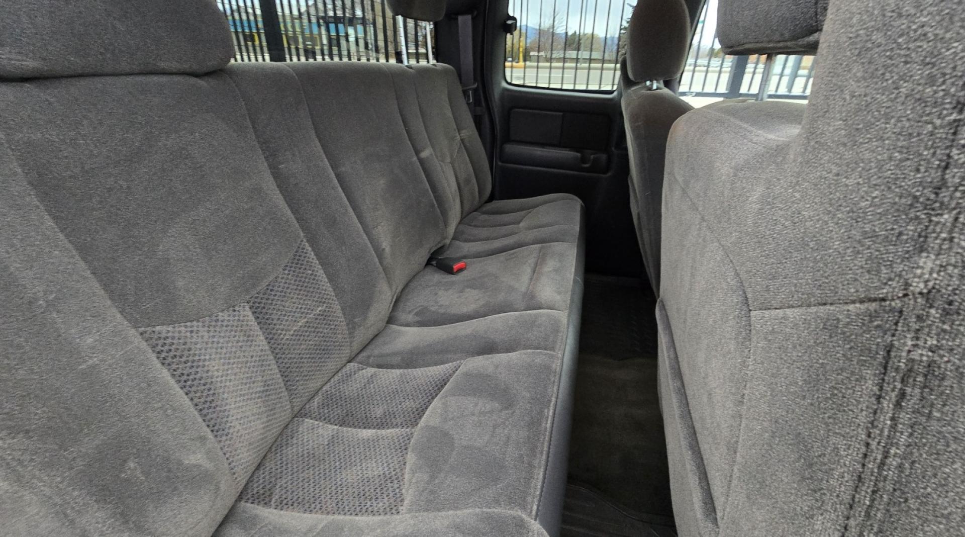 2004 White /Black Chevrolet Silverado 2500HD Ext. Cab Long Bed 4WD (1GCHK29G54E) with an 8.1L V8 OHV 16V engine, Automatic Transmission transmission, located at 450 N Russell, Missoula, MT, 59801, (406) 543-6600, 46.874496, -114.017433 - Near Impossible to find. Heavy Duty 3/4 Ton Chevy 4WD with the Impressive 8.1 Liter Vortec Engine. To top that, it only has 64K Miles! Excellent Condition. Automatic Transmission. Air. Cruise. Tilt. Power Windows and Locks. Power Drivers Seat. AM FM CD and Cassette Player for kicking it Old School. - Photo#16