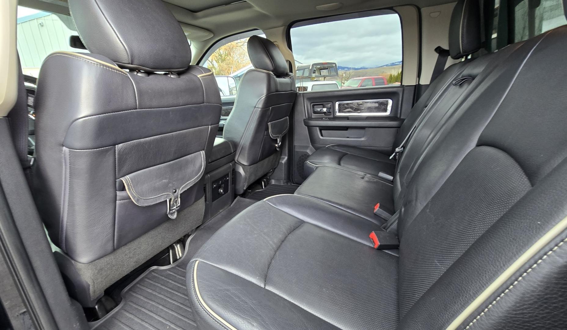 2012 Black /Black Dodge Ram 3500 Laramie Longhorn Edition Crew Cab SWB 4WD (3C63D3FL1CG) with an 6.7L L6 OHV 24V TURBO DIESEL engine, 6-Speed Automatic transmission, located at 450 N Russell, Missoula, MT, 59801, (406) 543-6600, 46.874496, -114.017433 - Beautiful 4WD Diesel Crew Cab. Tuner and is EGR Deleted 6.7L Cummins. Automatic Transmission. Touchscreen Alpine Stereo System. Heated Front and Rear Seats. Power Leather Front Seats. Heated Steering Wheel. Bluetooth Audio and Phone Connectivity. Backup Camera. Power Sunroof. Retractable Running Boa - Photo#11