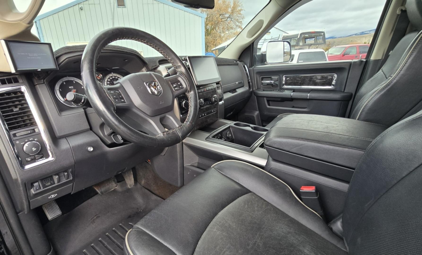 2012 Black /Black Dodge Ram 3500 Laramie Longhorn Edition Crew Cab SWB 4WD (3C63D3FL1CG) with an 6.7L L6 OHV 24V TURBO DIESEL engine, 6-Speed Automatic transmission, located at 450 N Russell, Missoula, MT, 59801, (406) 543-6600, 46.874496, -114.017433 - Beautiful 4WD Diesel Crew Cab. Tuner and is EGR Deleted 6.7L Cummins. Automatic Transmission. Touchscreen Alpine Stereo System. Heated Front and Rear Seats. Power Leather Front Seats. Heated Steering Wheel. Bluetooth Audio and Phone Connectivity. Backup Camera. Power Sunroof. Retractable Running Boa - Photo#15