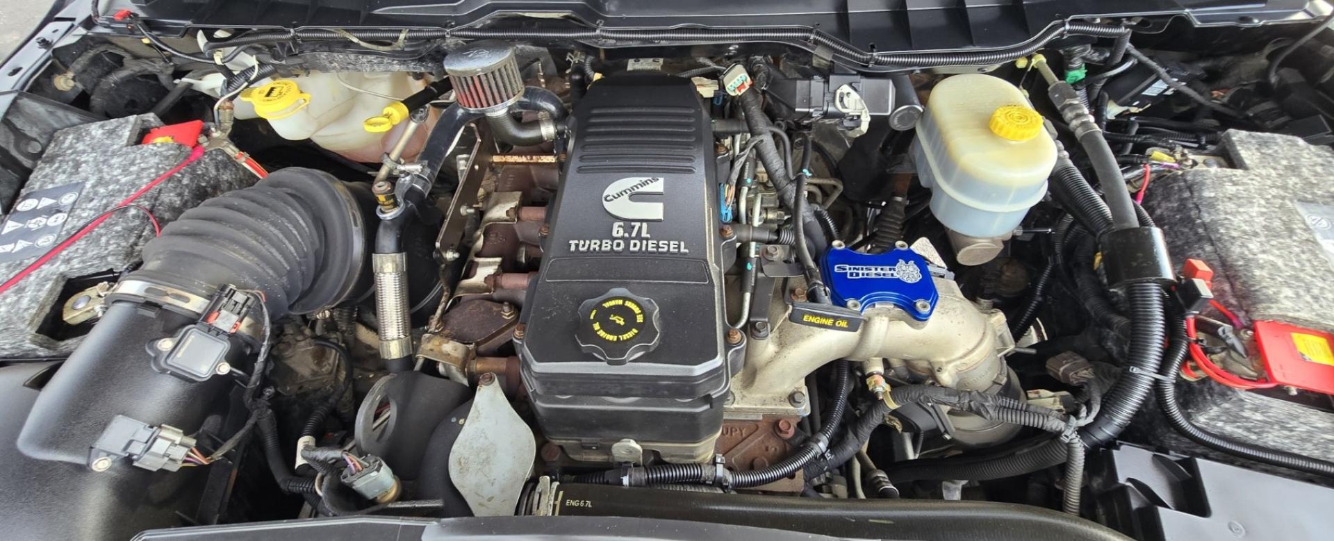 2012 Black /Black Dodge Ram 3500 Laramie Longhorn Edition Crew Cab SWB 4WD (3C63D3FL1CG) with an 6.7L L6 OHV 24V TURBO DIESEL engine, 6-Speed Automatic transmission, located at 450 N Russell, Missoula, MT, 59801, (406) 543-6600, 46.874496, -114.017433 - Beautiful 4WD Diesel Crew Cab. Tuner and is EGR Deleted 6.7L Cummins. Automatic Transmission. Touchscreen Alpine Stereo System. Heated Front and Rear Seats. Power Leather Front Seats. Heated Steering Wheel. Bluetooth Audio and Phone Connectivity. Backup Camera. Power Sunroof. Retractable Running Boa - Photo#20