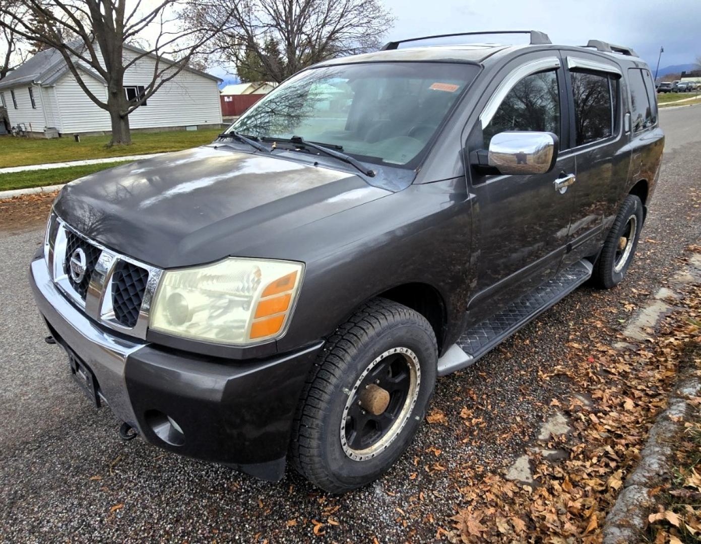 2004 Grey /Gray Nissan Armada LE 4WD (5N1AA08BX4N) with an 5.6L V8 DOHC 32V engine, 5-Speed Automatic Overdrive transmission, located at 450 N Russell, Missoula, MT, 59801, (406) 543-6600, 46.874496, -114.017433 - One Owner 4WD SUV. 5.6L V8 Engine. Loaded with features. CD Changer. Rear Entertainment. 3rd Row Seats, Heated Front Seats. Navigation. Power Sunroof. Running Boards. Dual Climate Control. Two Sets of tires and wheels. One of the sets is really only good for the wheels. The set on the vehicle is exc - Photo#4