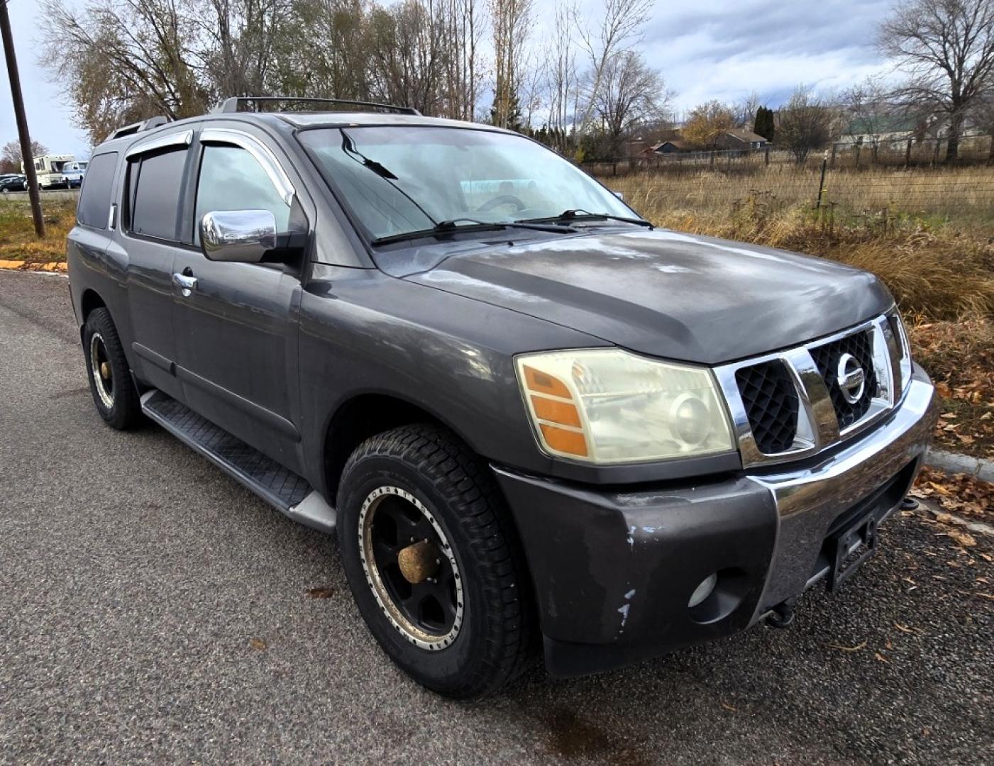 2004 Grey /Gray Nissan Armada LE 4WD (5N1AA08BX4N) with an 5.6L V8 DOHC 32V engine, 5-Speed Automatic Overdrive transmission, located at 450 N Russell, Missoula, MT, 59801, (406) 543-6600, 46.874496, -114.017433 - One Owner 4WD SUV. 5.6L V8 Engine. Loaded with features. CD Changer. Rear Entertainment. 3rd Row Seats, Heated Front Seats. Navigation. Power Sunroof. Running Boards. Dual Climate Control. Two Sets of tires and wheels. One of the sets is really only good for the wheels. The set on the vehicle is exc - Photo#6