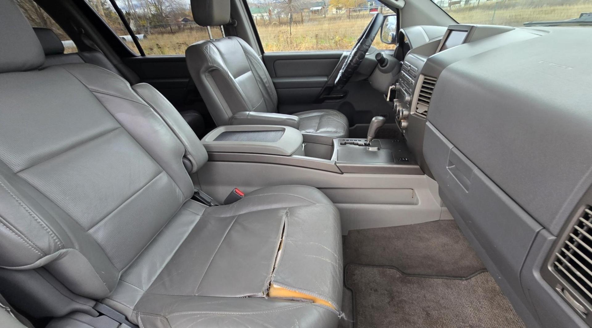 2004 Grey /Gray Nissan Armada LE 4WD (5N1AA08BX4N) with an 5.6L V8 DOHC 32V engine, 5-Speed Automatic Overdrive transmission, located at 450 N Russell, Missoula, MT, 59801, (406) 543-6600, 46.874496, -114.017433 - One Owner 4WD SUV. 5.6L V8 Engine. Loaded with features. CD Changer. Rear Entertainment. 3rd Row Seats, Heated Front Seats. Navigation. Power Sunroof. Running Boards. Dual Climate Control. Two Sets of tires and wheels. One of the sets is really only good for the wheels. The set on the vehicle is exc - Photo#7