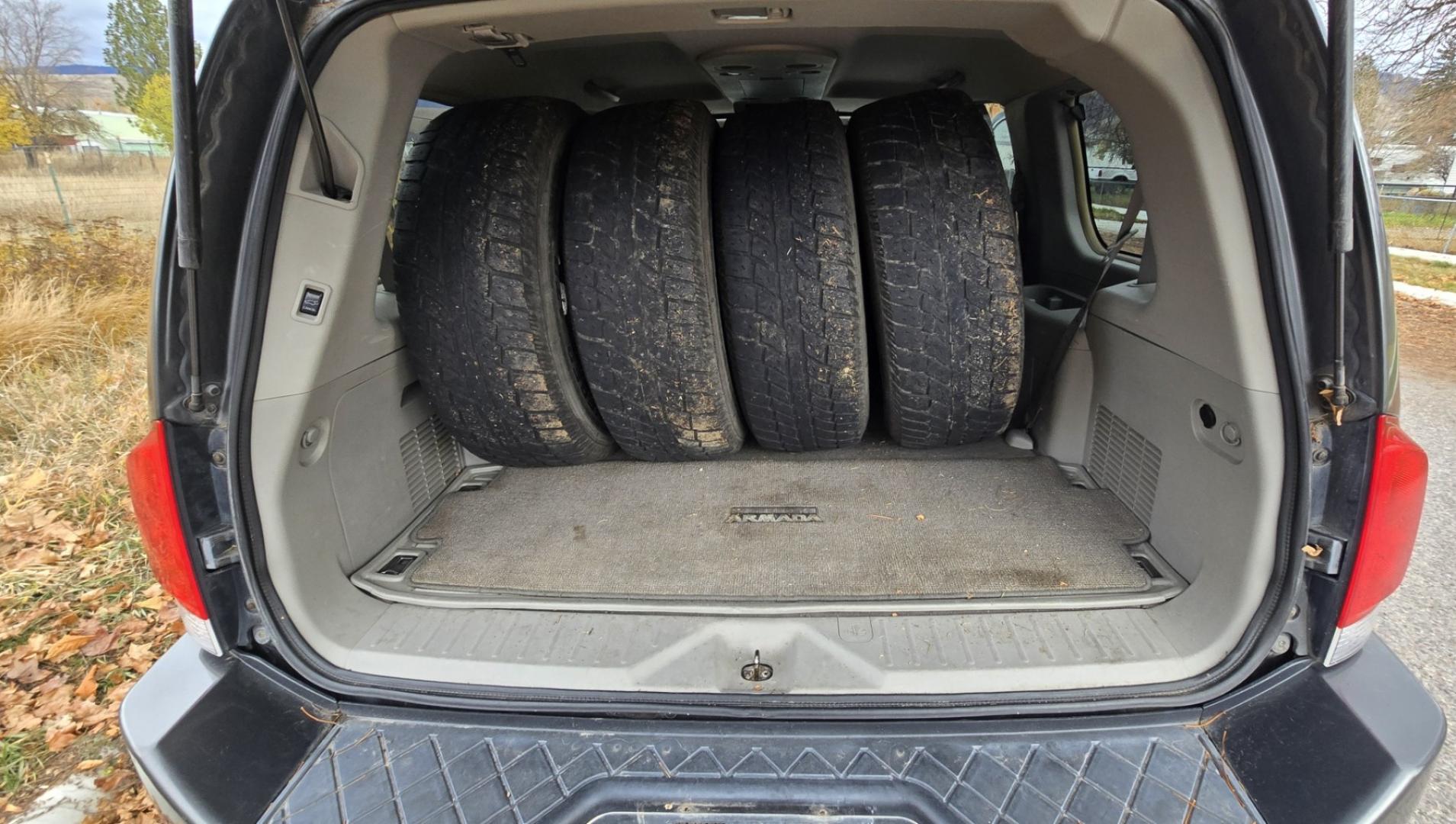 2004 Grey /Gray Nissan Armada LE 4WD (5N1AA08BX4N) with an 5.6L V8 DOHC 32V engine, 5-Speed Automatic Overdrive transmission, located at 450 N Russell, Missoula, MT, 59801, (406) 543-6600, 46.874496, -114.017433 - One Owner 4WD SUV. 5.6L V8 Engine. Loaded with features. CD Changer. Rear Entertainment. 3rd Row Seats, Heated Front Seats. Navigation. Power Sunroof. Running Boards. Dual Climate Control. Two Sets of tires and wheels. One of the sets is really only good for the wheels. The set on the vehicle is exc - Photo#10