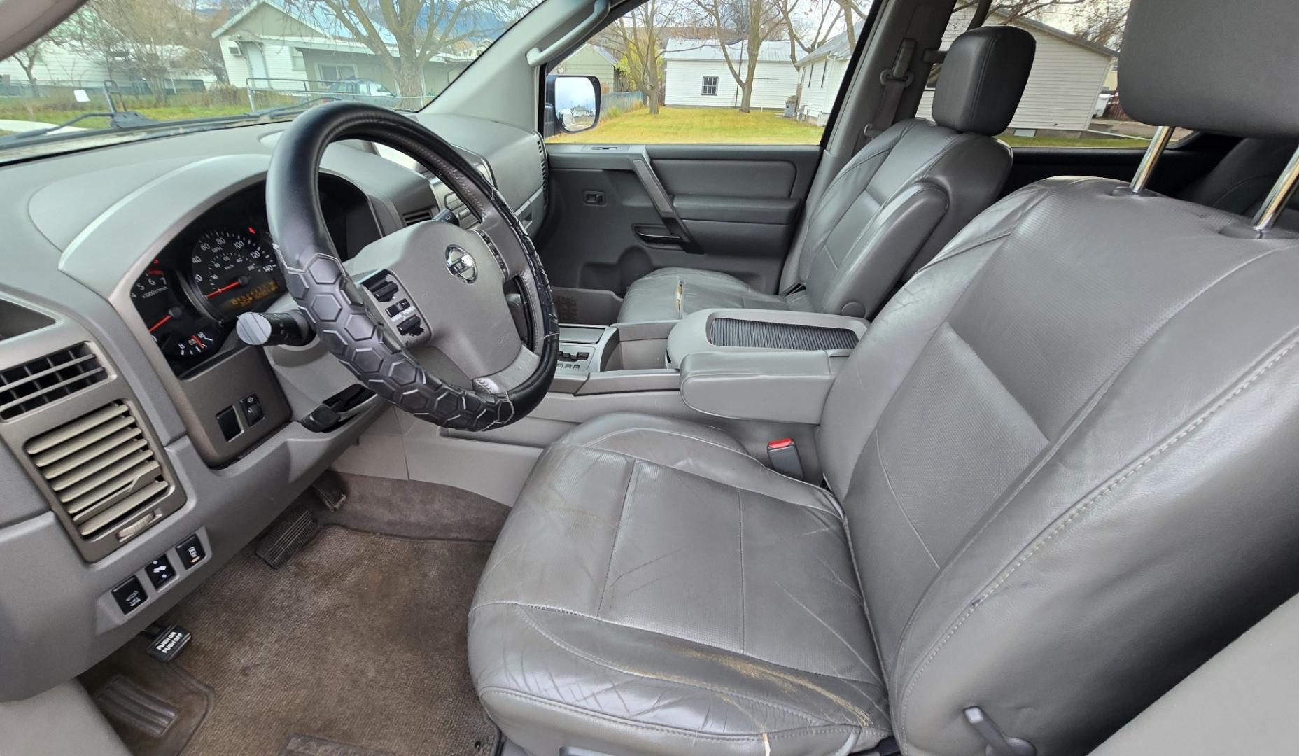 2004 Grey /Gray Nissan Armada LE 4WD (5N1AA08BX4N) with an 5.6L V8 DOHC 32V engine, 5-Speed Automatic Overdrive transmission, located at 450 N Russell, Missoula, MT, 59801, (406) 543-6600, 46.874496, -114.017433 - One Owner 4WD SUV. 5.6L V8 Engine. Loaded with features. CD Changer. Rear Entertainment. 3rd Row Seats, Heated Front Seats. Navigation. Power Sunroof. Running Boards. Dual Climate Control. Two Sets of tires and wheels. One of the sets is really only good for the wheels. The set on the vehicle is exc - Photo#11