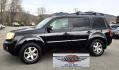 2009 Black /Black Honda Pilot Touring 4WD with RES & Navigation (5FNYF48919B) with an 3.5L V6 SOHC 24V engine, 5-Speed Automatic Overdrive transmission, located at 450 N Russell, Missoula, MT, 59801, (406) 543-6600, 46.874496, -114.017433 - Yes it's a lot of miles but the motor has been well maintained. New Timing Belt only has 18K Miles on it. Runs Amazing. 3.5L V6 has lots of pep. 4WD Works Great., Nice All terrain tires are like new, Heated Power Leather Front Seats. 3rd Row Seating in the back. Power Sun Roof. Power Windows and Loc - Photo#2