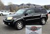 2009 Black /Black Honda Pilot Touring 4WD with RES & Navigation (5FNYF48919B) with an 3.5L V6 SOHC 24V engine, 5-Speed Automatic Overdrive transmission, located at 450 N Russell, Missoula, MT, 59801, (406) 543-6600, 46.874496, -114.017433 - Yes it's a lot of miles but the motor has been well maintained. New Timing Belt only has 18K Miles on it. Runs Amazing. 3.5L V6 has lots of pep. 4WD Works Great., Nice All terrain tires are like new, Heated Power Leather Front Seats. 3rd Row Seating in the back. Power Sun Roof. Power Windows and Loc - Photo#0