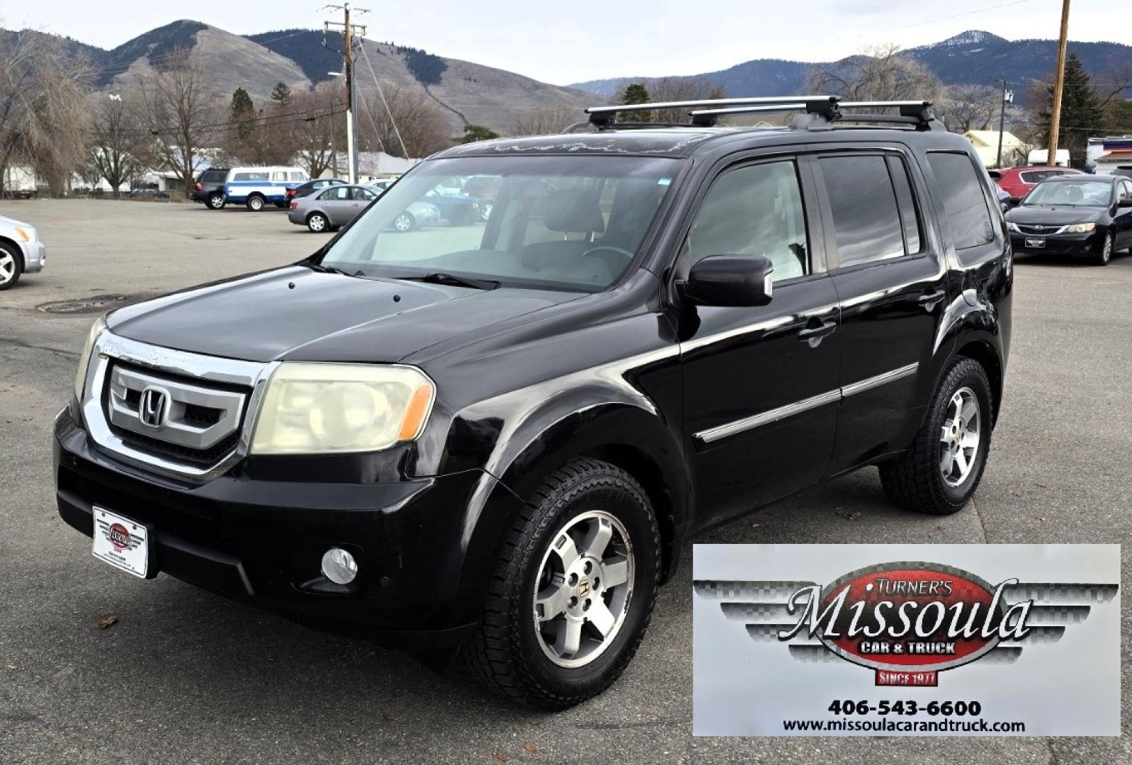 2009 Black /Black Honda Pilot Touring 4WD with RES & Navigation (5FNYF48919B) with an 3.5L V6 SOHC 24V engine, 5-Speed Automatic Overdrive transmission, located at 450 N Russell, Missoula, MT, 59801, (406) 543-6600, 46.874496, -114.017433 - Yes it's a lot of miles but the motor has been well maintained. New Timing Belt only has 18K Miles on it. Runs Amazing. 3.5L V6 has lots of pep. 4WD Works Great., Nice All terrain tires are like new, Heated Power Leather Front Seats. 3rd Row Seating in the back. Power Sun Roof. Power Windows and Loc - Photo#1