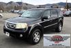 2009 Black /Black Honda Pilot Touring 4WD with RES & Navigation (5FNYF48919B) with an 3.5L V6 SOHC 24V engine, 5-Speed Automatic Overdrive transmission, located at 450 N Russell, Missoula, MT, 59801, (406) 543-6600, 46.874496, -114.017433 - Yes it's a lot of miles but the motor has been well maintained. New Timing Belt only has 18K Miles on it. Runs Amazing. 3.5L V6 has lots of pep. 4WD Works Great., Nice All terrain tires are like new, Heated Power Leather Front Seats. 3rd Row Seating in the back. Power Sun Roof. Power Windows and Loc - Photo#1
