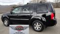 2009 Black /Black Honda Pilot Touring 4WD with RES & Navigation (5FNYF48919B) with an 3.5L V6 SOHC 24V engine, 5-Speed Automatic Overdrive transmission, located at 450 N Russell, Missoula, MT, 59801, (406) 543-6600, 46.874496, -114.017433 - Yes it's a lot of miles but the motor has been well maintained. New Timing Belt only has 18K Miles on it. Runs Amazing. 3.5L V6 has lots of pep. 4WD Works Great., Nice All terrain tires are like new, Heated Power Leather Front Seats. 3rd Row Seating in the back. Power Sun Roof. Power Windows and Loc - Photo#3