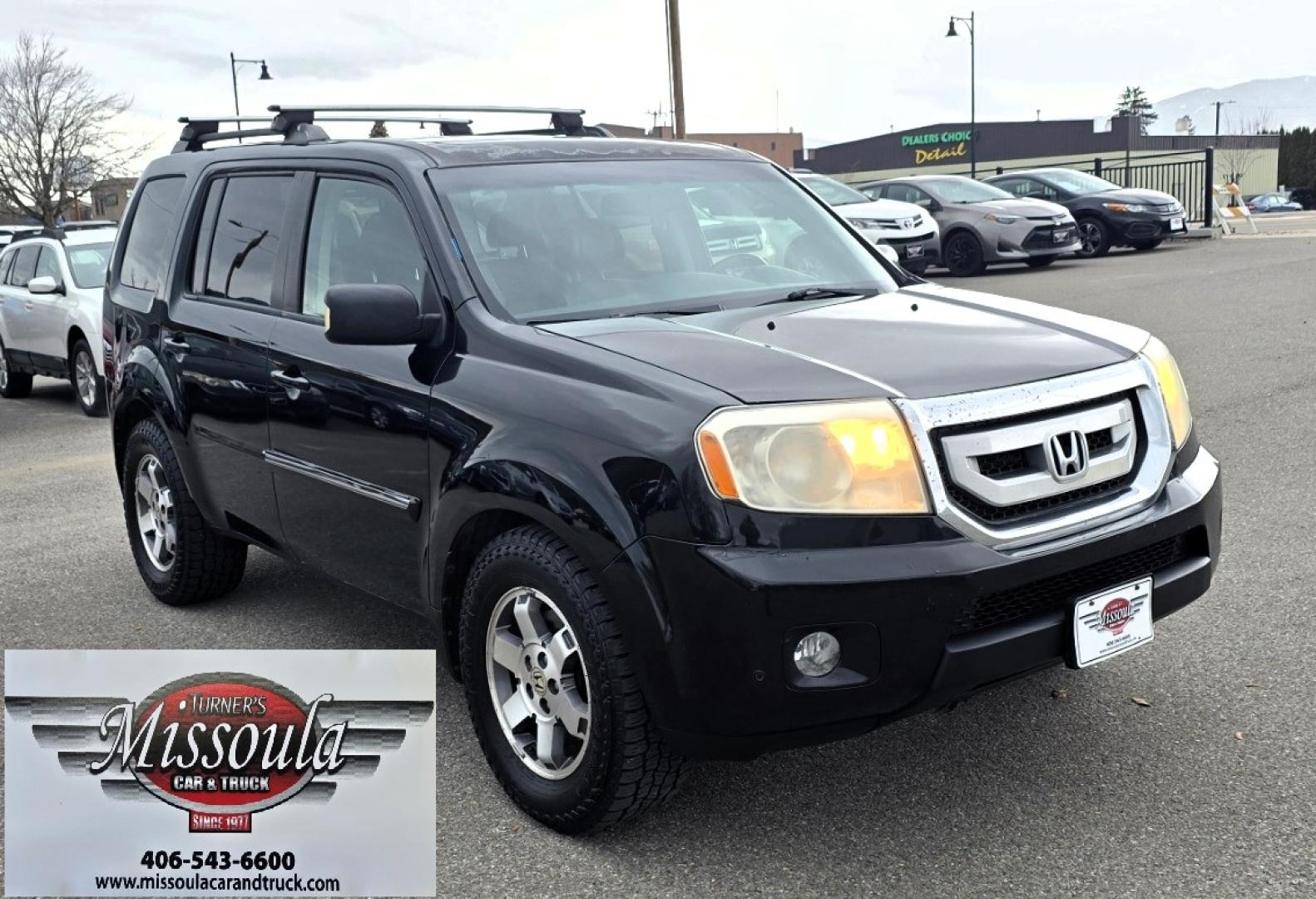 2009 Black /Black Honda Pilot Touring 4WD with RES & Navigation (5FNYF48919B) with an 3.5L V6 SOHC 24V engine, 5-Speed Automatic Overdrive transmission, located at 450 N Russell, Missoula, MT, 59801, (406) 543-6600, 46.874496, -114.017433 - Yes it's a lot of miles but the motor has been well maintained. New Timing Belt only has 18K Miles on it. Runs Amazing. 3.5L V6 has lots of pep. 4WD Works Great., Nice All terrain tires are like new, Heated Power Leather Front Seats. 3rd Row Seating in the back. Power Sun Roof. Power Windows and Loc - Photo#9