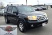 2009 Black /Black Honda Pilot Touring 4WD with RES & Navigation (5FNYF48919B) with an 3.5L V6 SOHC 24V engine, 5-Speed Automatic Overdrive transmission, located at 450 N Russell, Missoula, MT, 59801, (406) 543-6600, 46.874496, -114.017433 - Yes it's a lot of miles but the motor has been well maintained. New Timing Belt only has 18K Miles on it. Runs Amazing. 3.5L V6 has lots of pep. 4WD Works Great., Nice All terrain tires are like new, Heated Power Leather Front Seats. 3rd Row Seating in the back. Power Sun Roof. Power Windows and Loc - Photo#9