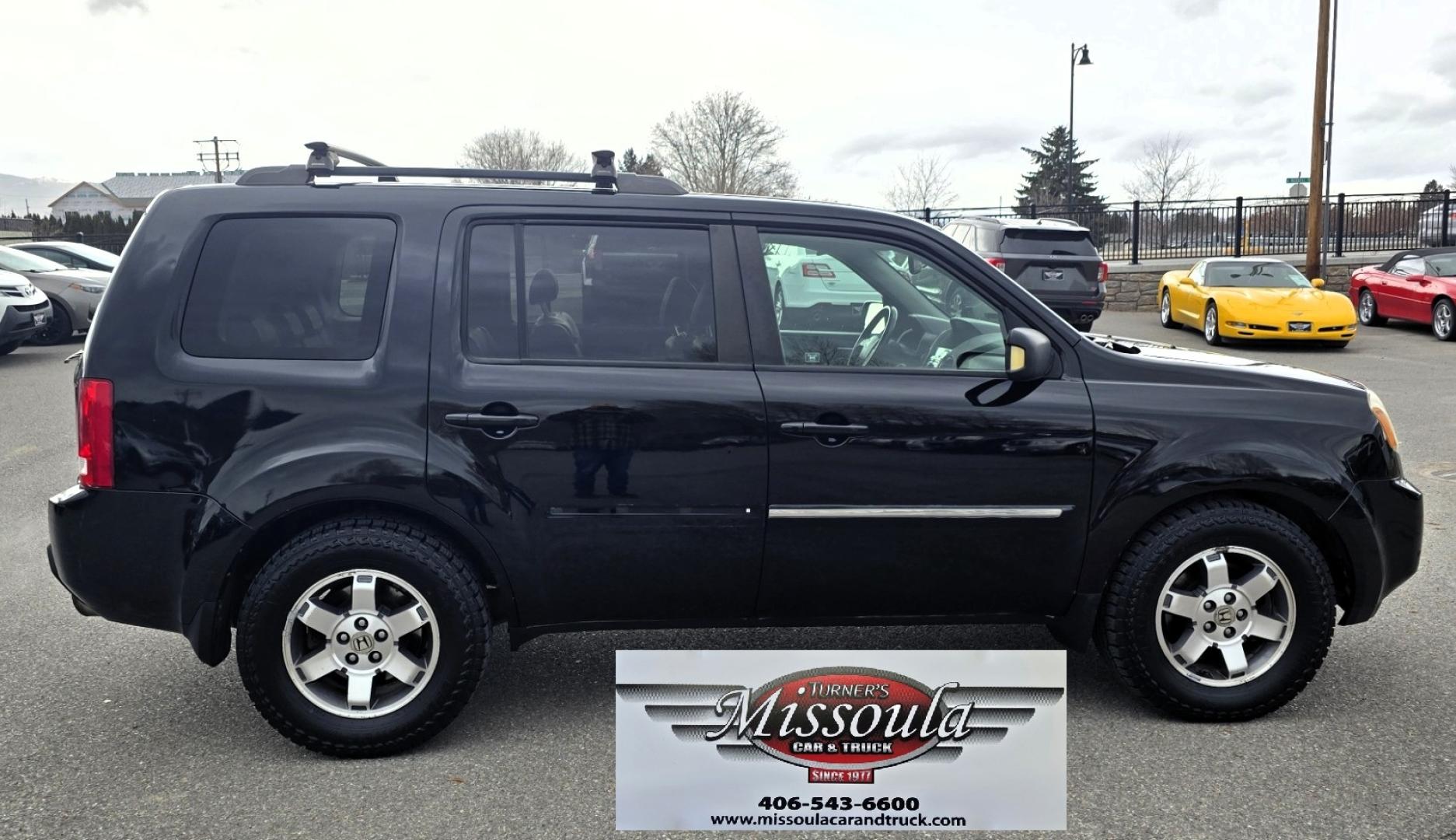 2009 Black /Black Honda Pilot Touring 4WD with RES & Navigation (5FNYF48919B) with an 3.5L V6 SOHC 24V engine, 5-Speed Automatic Overdrive transmission, located at 450 N Russell, Missoula, MT, 59801, (406) 543-6600, 46.874496, -114.017433 - Yes it's a lot of miles but the motor has been well maintained. New Timing Belt only has 18K Miles on it. Runs Amazing. 3.5L V6 has lots of pep. 4WD Works Great., Nice All terrain tires are like new, Heated Power Leather Front Seats. 3rd Row Seating in the back. Power Sun Roof. Power Windows and Loc - Photo#7