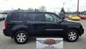 2009 Black /Black Honda Pilot Touring 4WD with RES & Navigation (5FNYF48919B) with an 3.5L V6 SOHC 24V engine, 5-Speed Automatic Overdrive transmission, located at 450 N Russell, Missoula, MT, 59801, (406) 543-6600, 46.874496, -114.017433 - Yes it's a lot of miles but the motor has been well maintained. New Timing Belt only has 18K Miles on it. Runs Amazing. 3.5L V6 has lots of pep. 4WD Works Great., Nice All terrain tires are like new, Heated Power Leather Front Seats. 3rd Row Seating in the back. Power Sun Roof. Power Windows and Loc - Photo#7