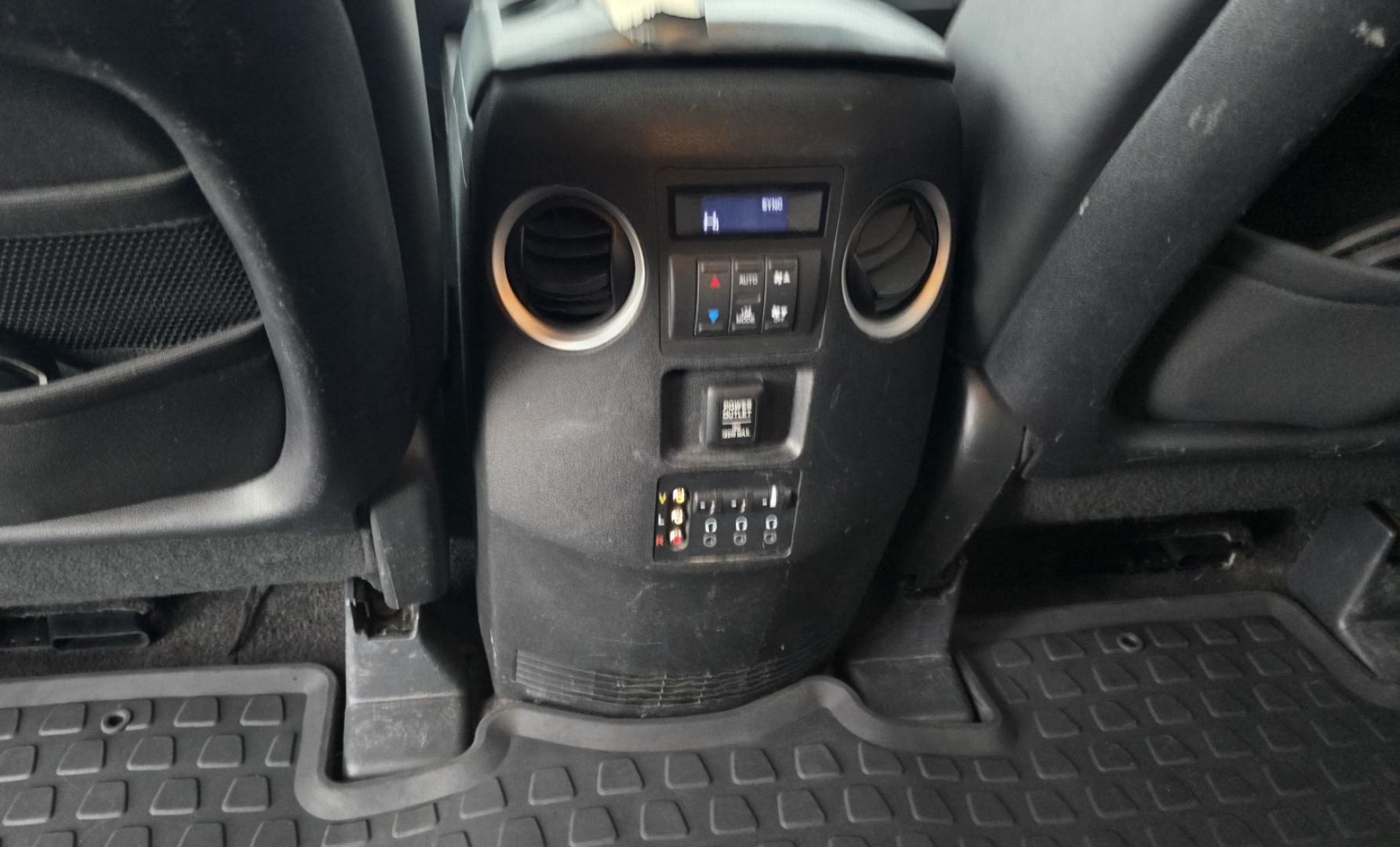 2009 Black /Black Honda Pilot Touring 4WD with RES & Navigation (5FNYF48919B) with an 3.5L V6 SOHC 24V engine, 5-Speed Automatic Overdrive transmission, located at 450 N Russell, Missoula, MT, 59801, (406) 543-6600, 46.874496, -114.017433 - Yes it's a lot of miles but the motor has been well maintained. New Timing Belt only has 18K Miles on it. Runs Amazing. 3.5L V6 has lots of pep. 4WD Works Great., Nice All terrain tires are like new, Heated Power Leather Front Seats. 3rd Row Seating in the back. Power Sun Roof. Power Windows and Loc - Photo#11