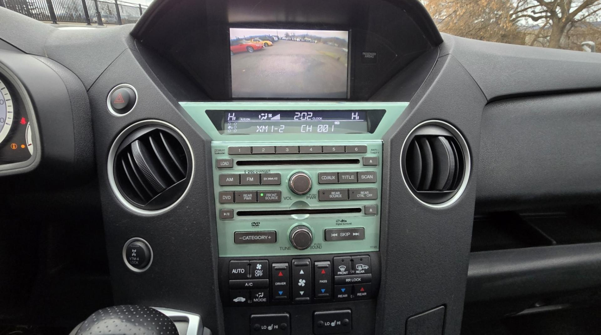 2009 Black /Black Honda Pilot Touring 4WD with RES & Navigation (5FNYF48919B) with an 3.5L V6 SOHC 24V engine, 5-Speed Automatic Overdrive transmission, located at 450 N Russell, Missoula, MT, 59801, (406) 543-6600, 46.874496, -114.017433 - Yes it's a lot of miles but the motor has been well maintained. New Timing Belt only has 18K Miles on it. Runs Amazing. 3.5L V6 has lots of pep. 4WD Works Great., Nice All terrain tires are like new, Heated Power Leather Front Seats. 3rd Row Seating in the back. Power Sun Roof. Power Windows and Loc - Photo#16