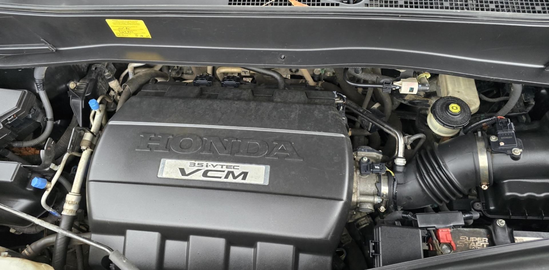 2009 Black /Black Honda Pilot Touring 4WD with RES & Navigation (5FNYF48919B) with an 3.5L V6 SOHC 24V engine, 5-Speed Automatic Overdrive transmission, located at 450 N Russell, Missoula, MT, 59801, (406) 543-6600, 46.874496, -114.017433 - Yes it's a lot of miles but the motor has been well maintained. New Timing Belt only has 18K Miles on it. Runs Amazing. 3.5L V6 has lots of pep. 4WD Works Great., Nice All terrain tires are like new, Heated Power Leather Front Seats. 3rd Row Seating in the back. Power Sun Roof. Power Windows and Loc - Photo#22