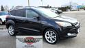 2013 Black /Black Ford Escape Titanium 4WD (1FMCU9J91DU) with an 2.0L L4 DOHC 16V engine, 6-Speed Automatic transmission, located at 450 N Russell, Missoula, MT, 59801, (406) 543-6600, 46.874496, -114.017433 - Cute AWD SUV. 2.0L I4 Engine runs Amazing! Huge Panoramic Sunroof. Navigation. Heated Leather Front Seats. AM FM CD Player with Bluetooth Audio and Phone Connectivity. Backup Camera. Power Lift Gate. Remote Start. Clean Title and Carfax. We Finance through local Credit Unions. We do NOT offer In - Photo#4